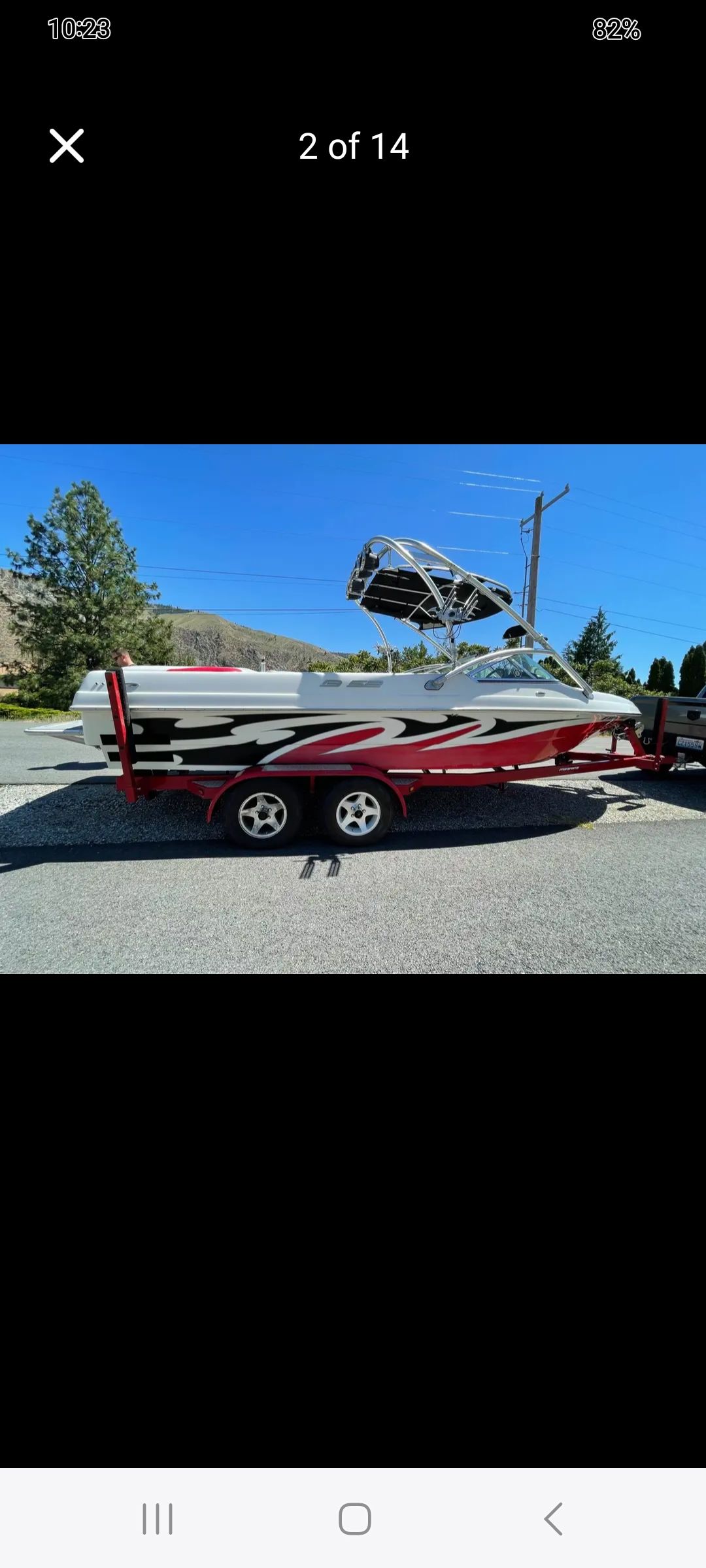 2006 MB PIGPR boat on trailer, side view.