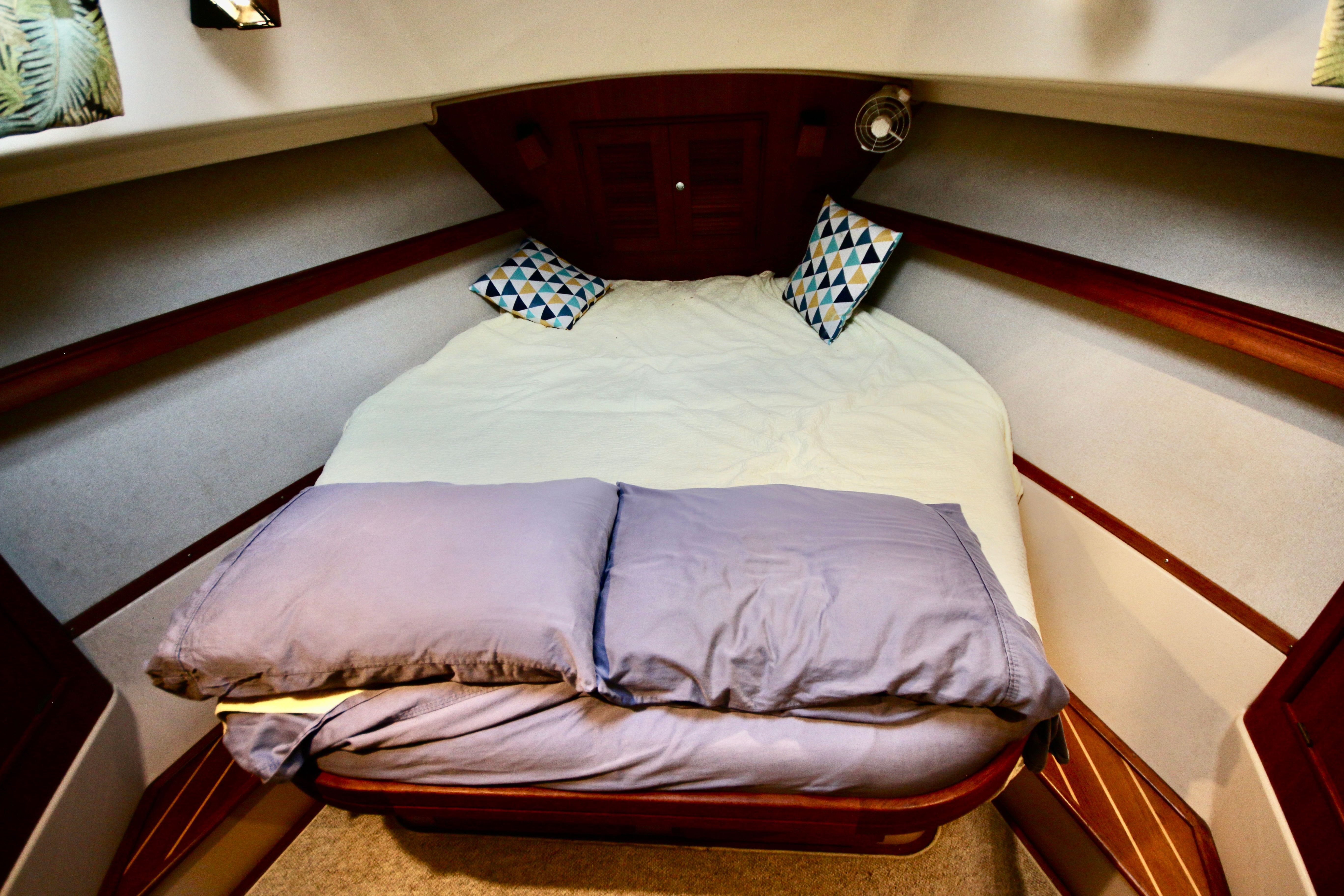 Interior of 2002 Island Packet 380 yacht featuring a cozy bed.