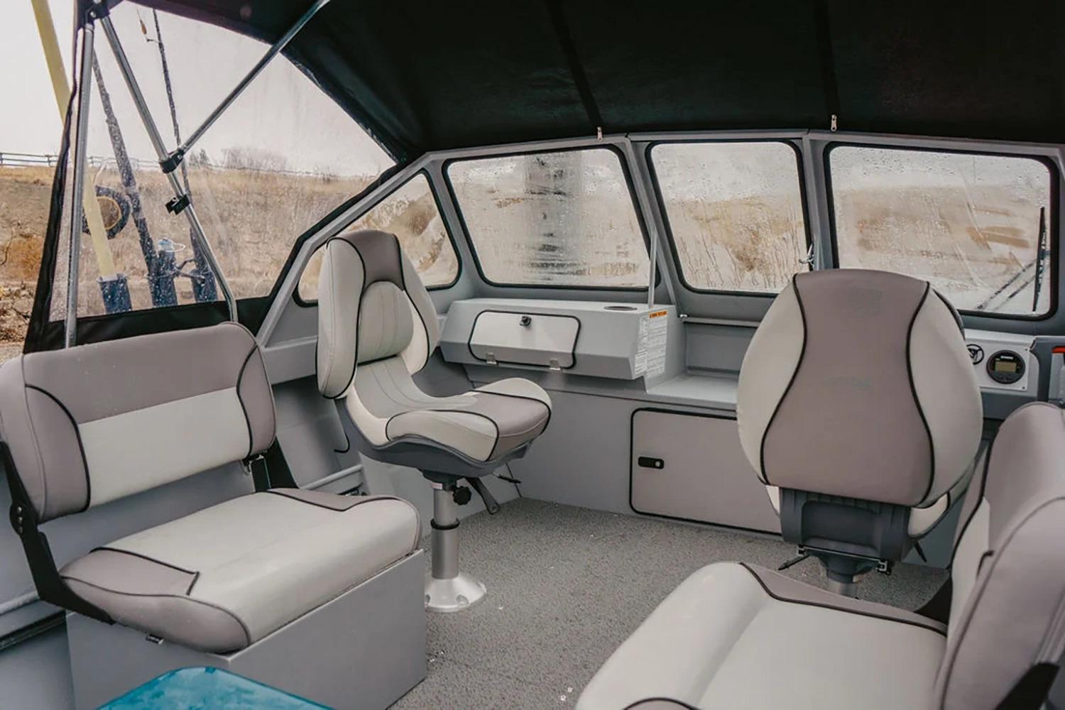 Manufacturer Provided Image: Interior of 2026 KingFisher 16 Falcon boat with modern seating and panoramic windows.