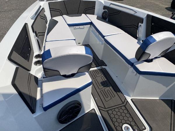 2021 Scarab 255 Open ID boat interior with white and blue seating.