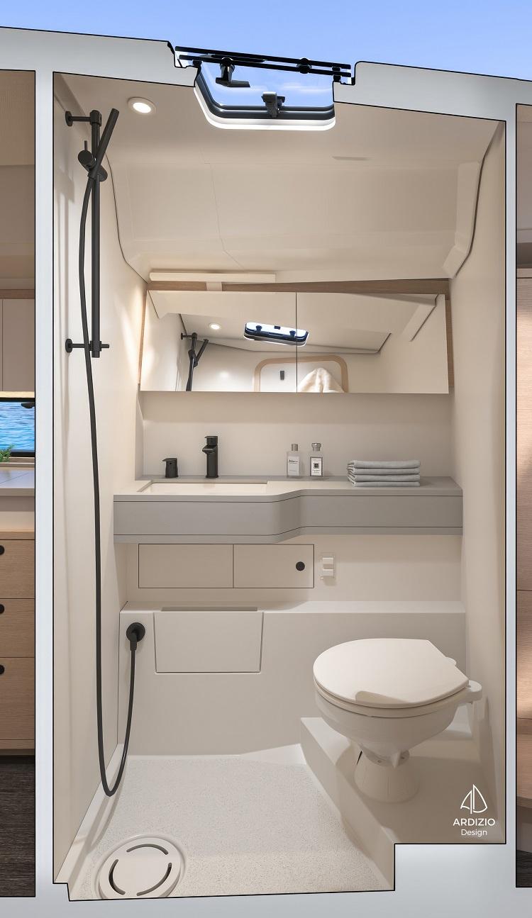 Modern bathroom interior of Dufour 44 yacht with shower and toilet.