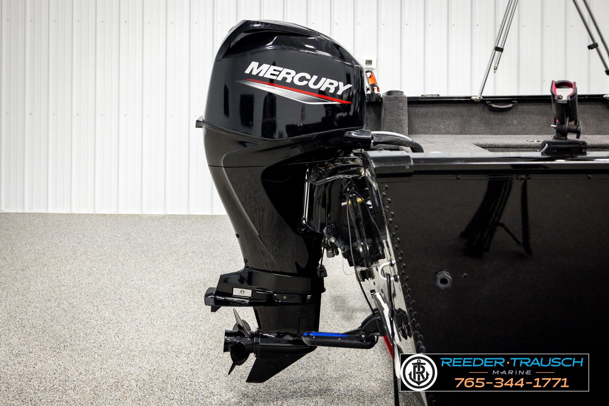 2025 Lund 1650 Rebel XL SS boat with Mercury outboard motor in showroom.