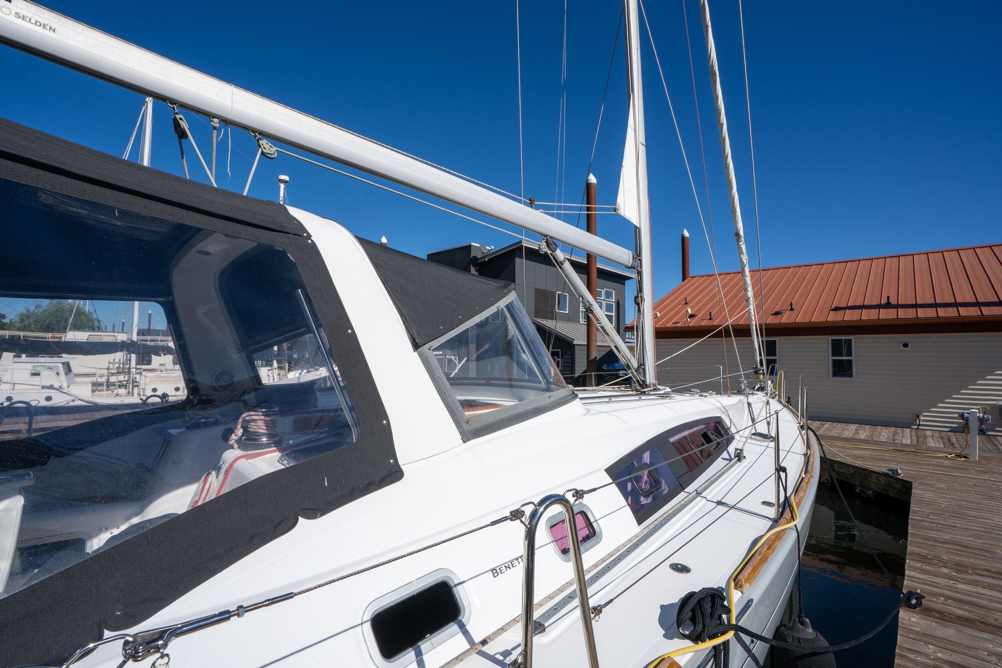 2013 Beneteau Oceanis 50 sailboat docked, showcasing sleek design and modern features.