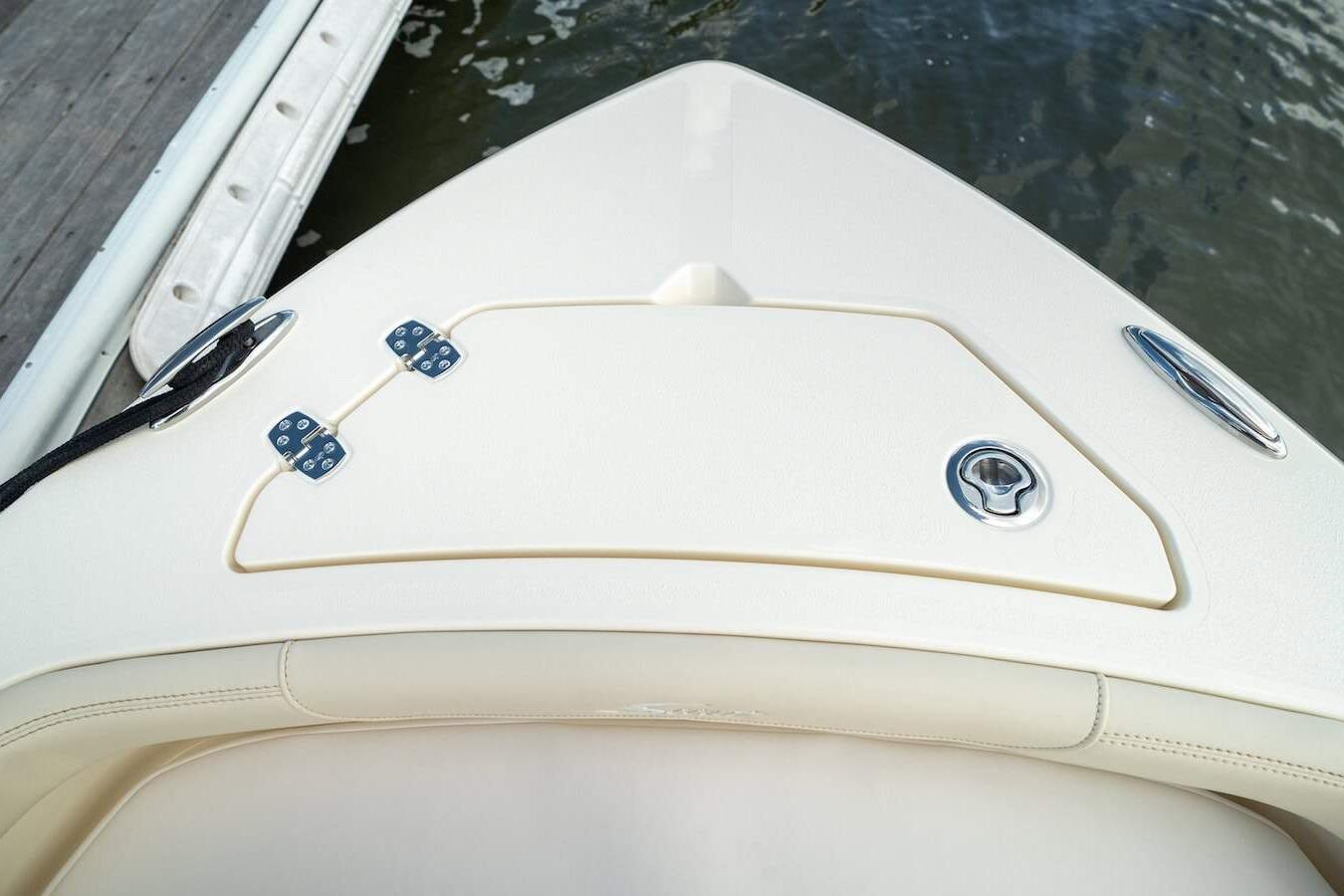 2026 Scout 188 Sportfish boat bow with storage compartment and sleek design.