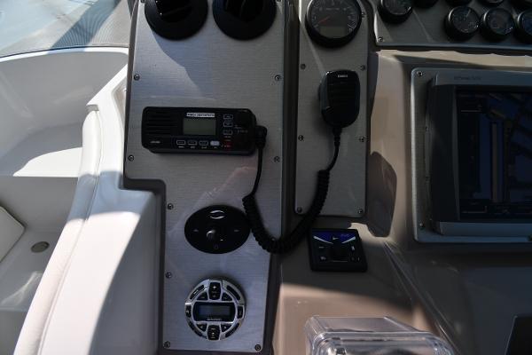 2010 Cruisers Yachts 390 Sports Coupe dashboard with radio and controls.