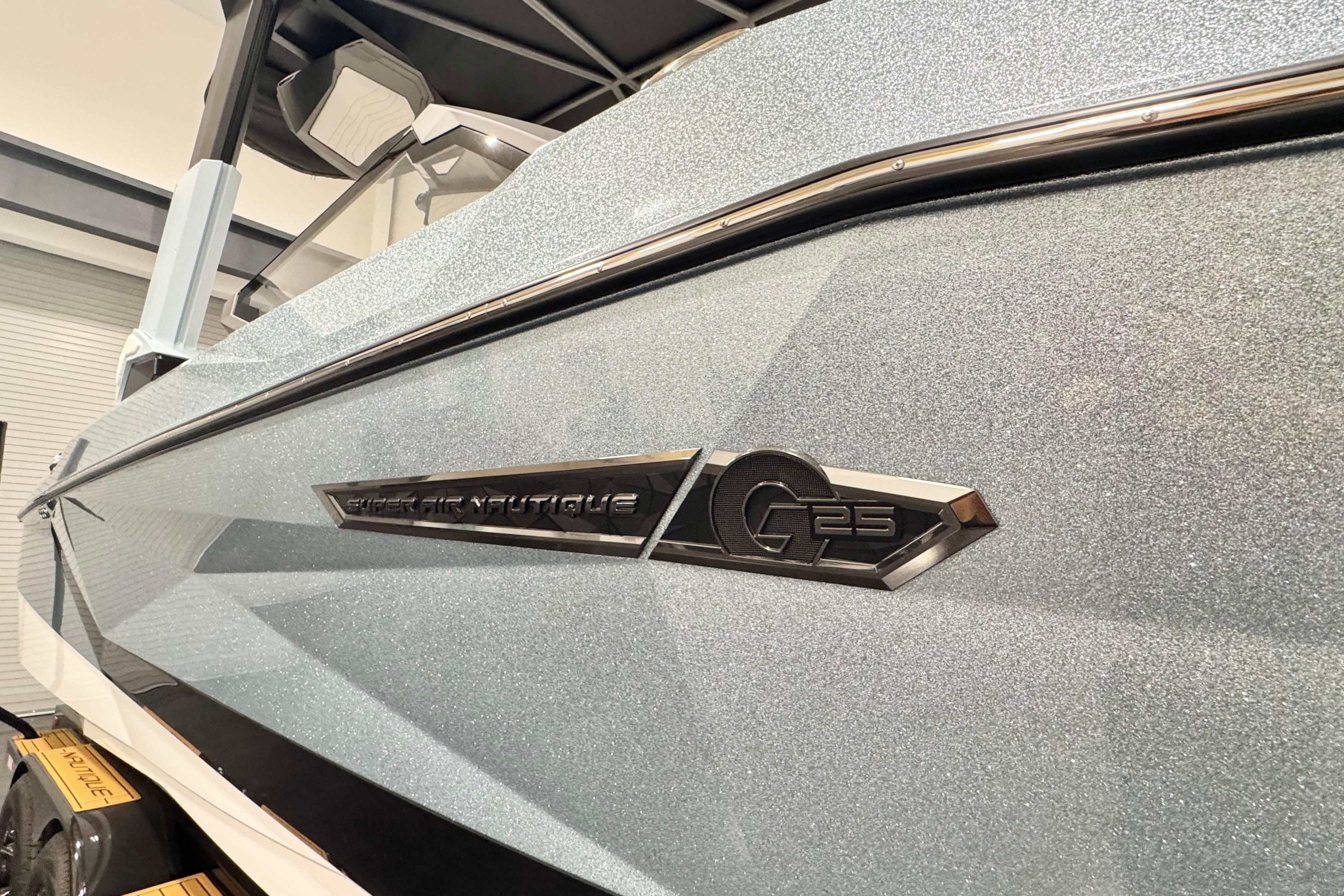 2026 Nautique Super Air Nautique G23 Paragon boat, sleek design, close-up view.