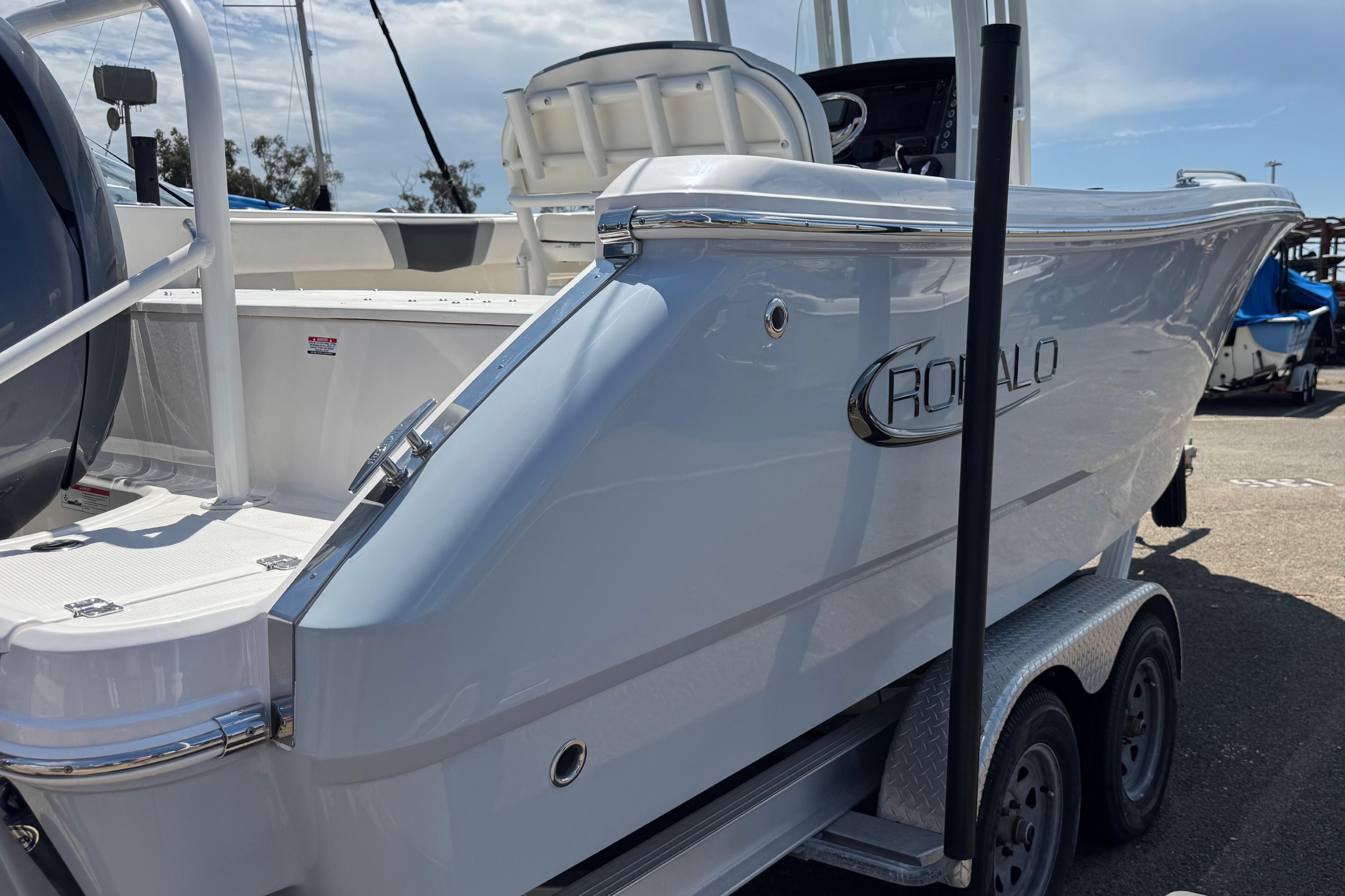 2022 Robalo R230 Center Console boat on trailer, rear view.