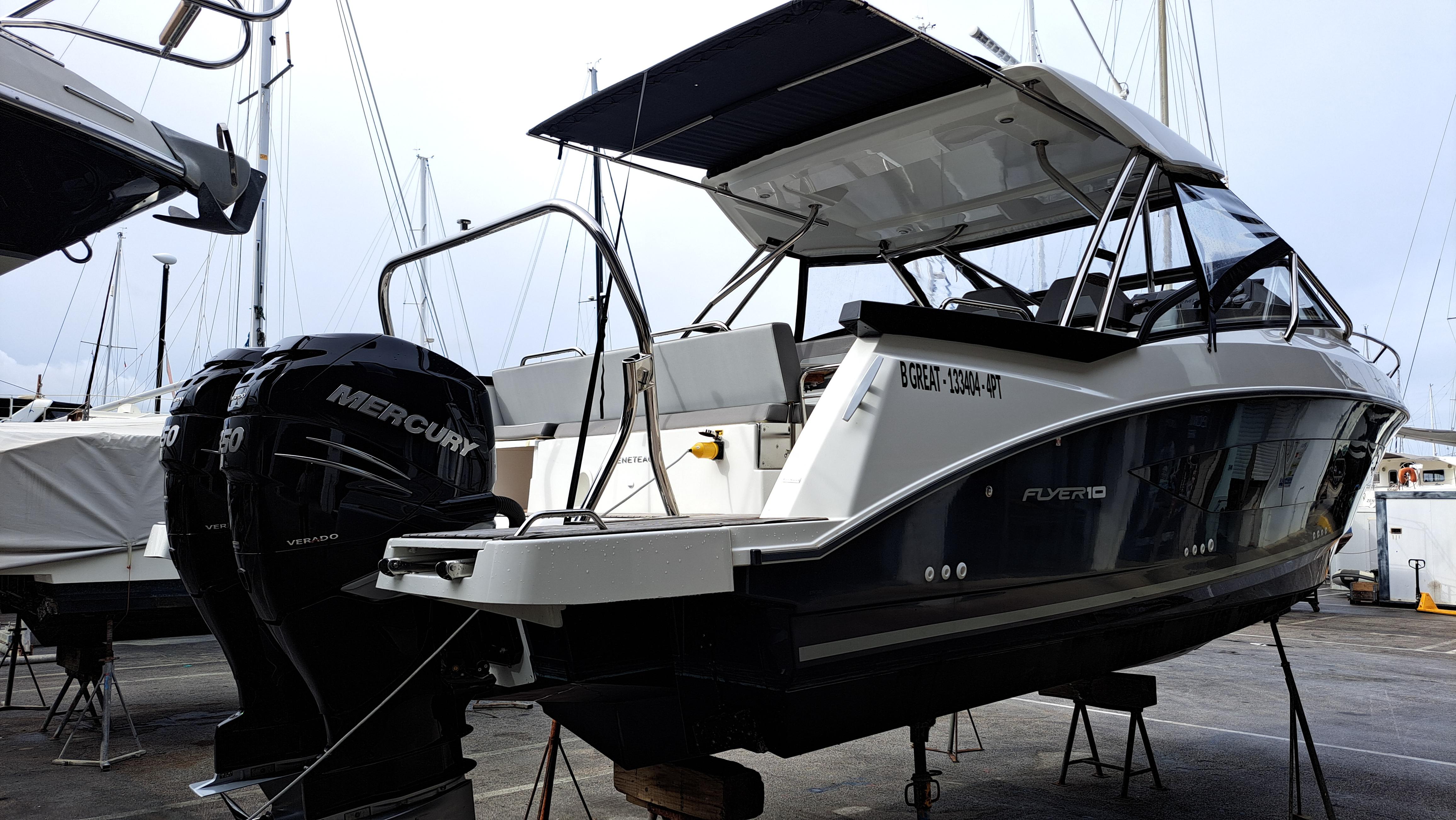 2023 Beneteau Flyer 10 boat with Mercury engine, docked in a marina.