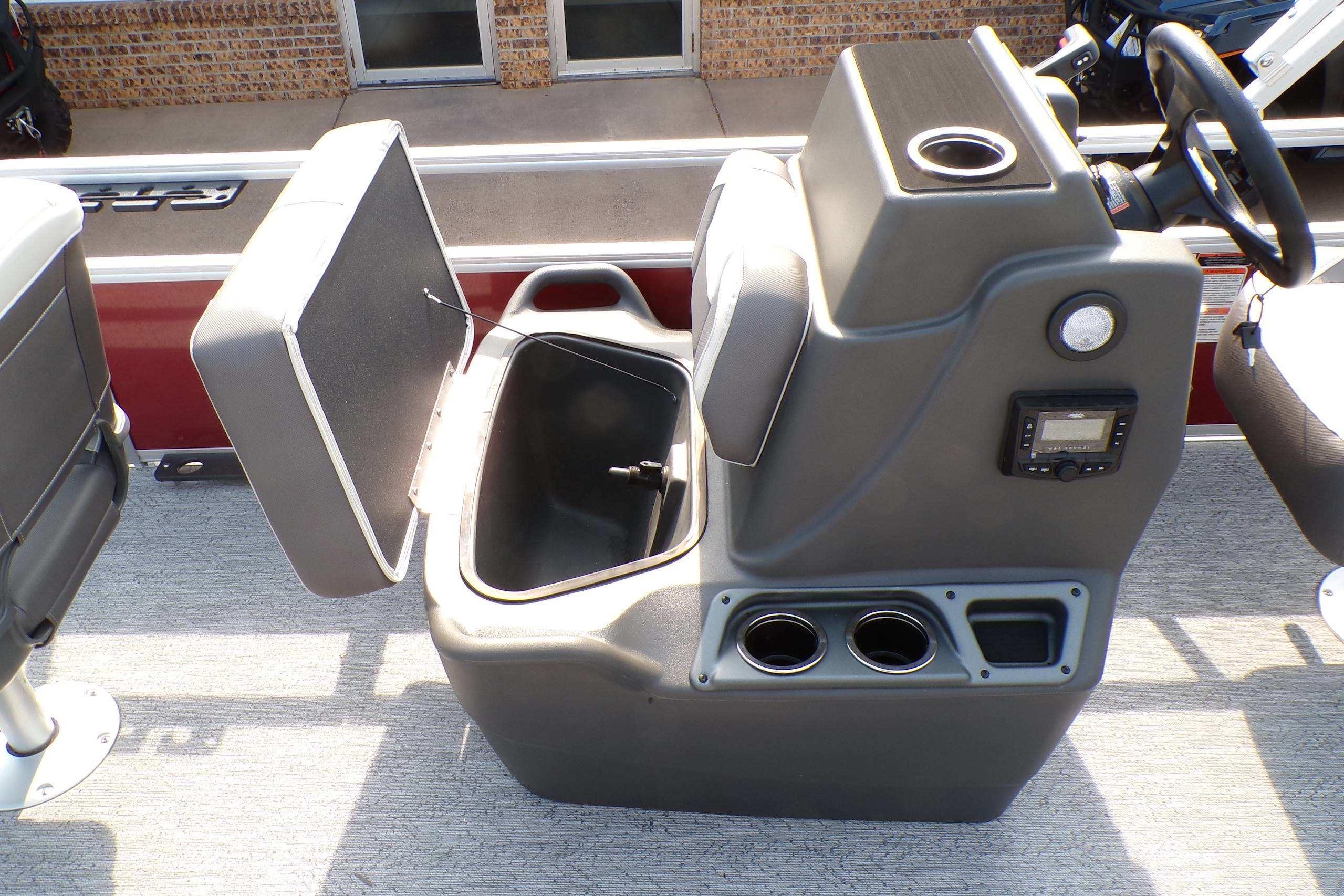2026 Sun Tracker Bass Buggy 16 XL Select boat console with storage and cup holders.