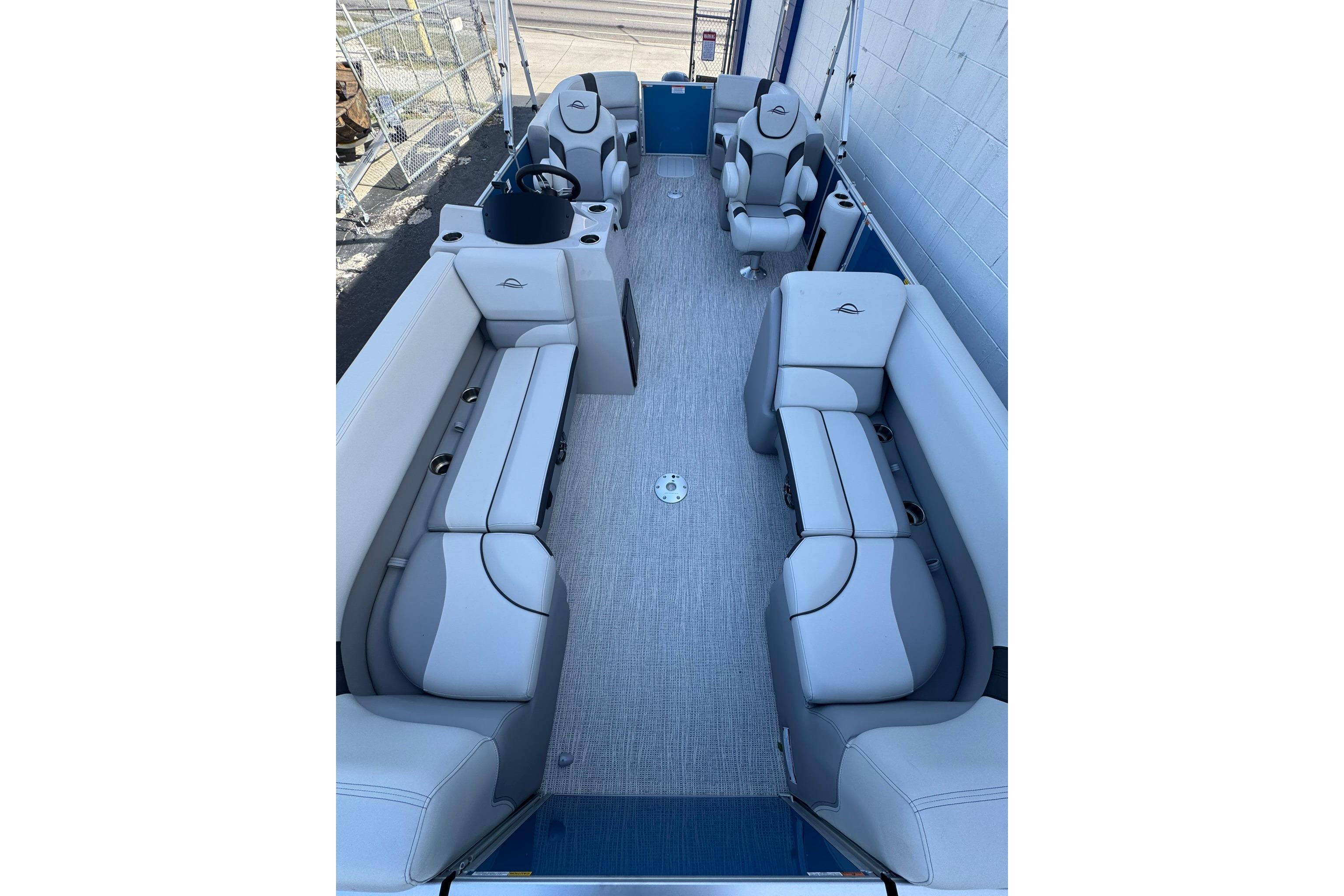 2026 SunCatcher Select 22RC pontoon boat interior with spacious seating and modern design.