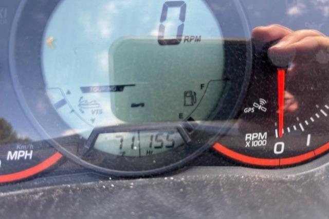 Close-up of 2010 Sea-Doo GTX 155 dashboard showing speedometer and RPM gauge.
