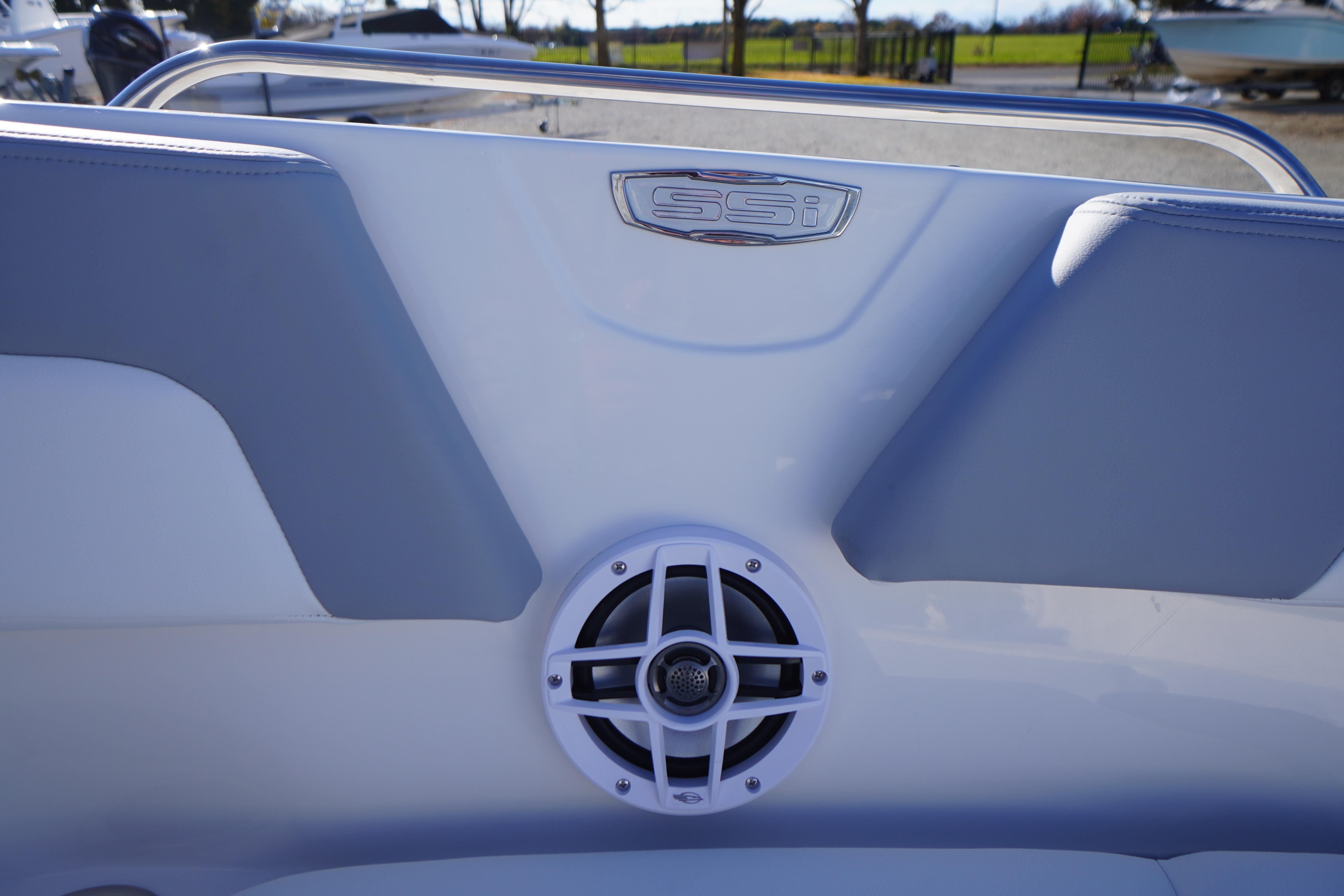 2026 Chaparral 23 SSi boat interior with speaker and SSI logo.
