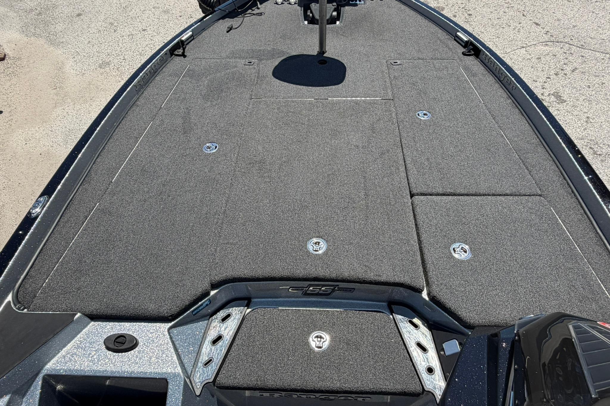 2023 Ranger Z521R boat deck with carpeted surface and storage compartments.