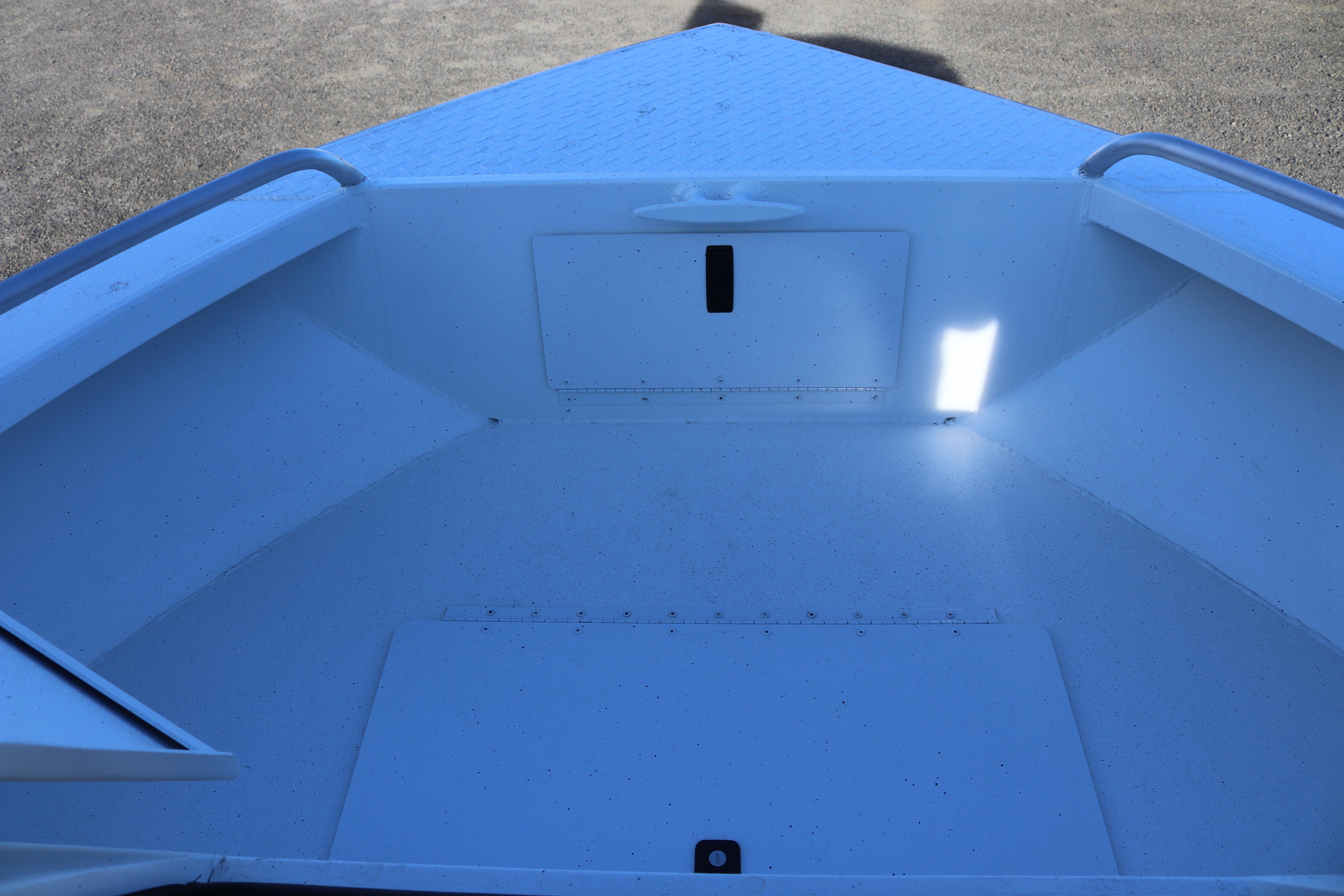2026 Alumaweld Intruder Outboard 22 boat interior, featuring spacious storage compartments.