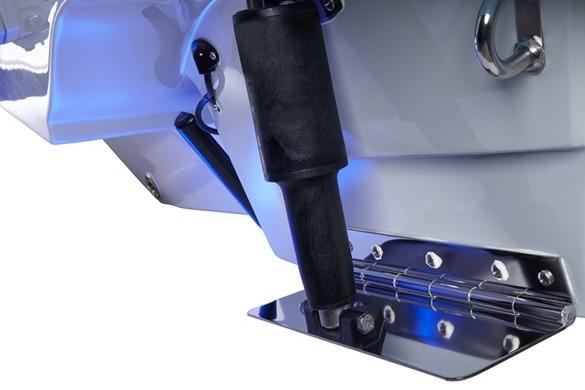 2024 Finseeker 280 DC boat detail showcasing trim tab and hydraulic system.