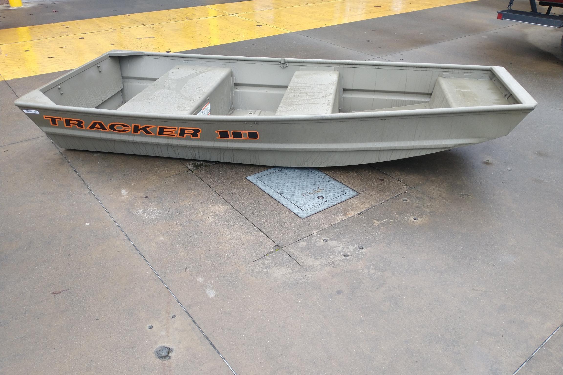 2026 Tracker Grizzly 10 Jon boat on concrete surface.