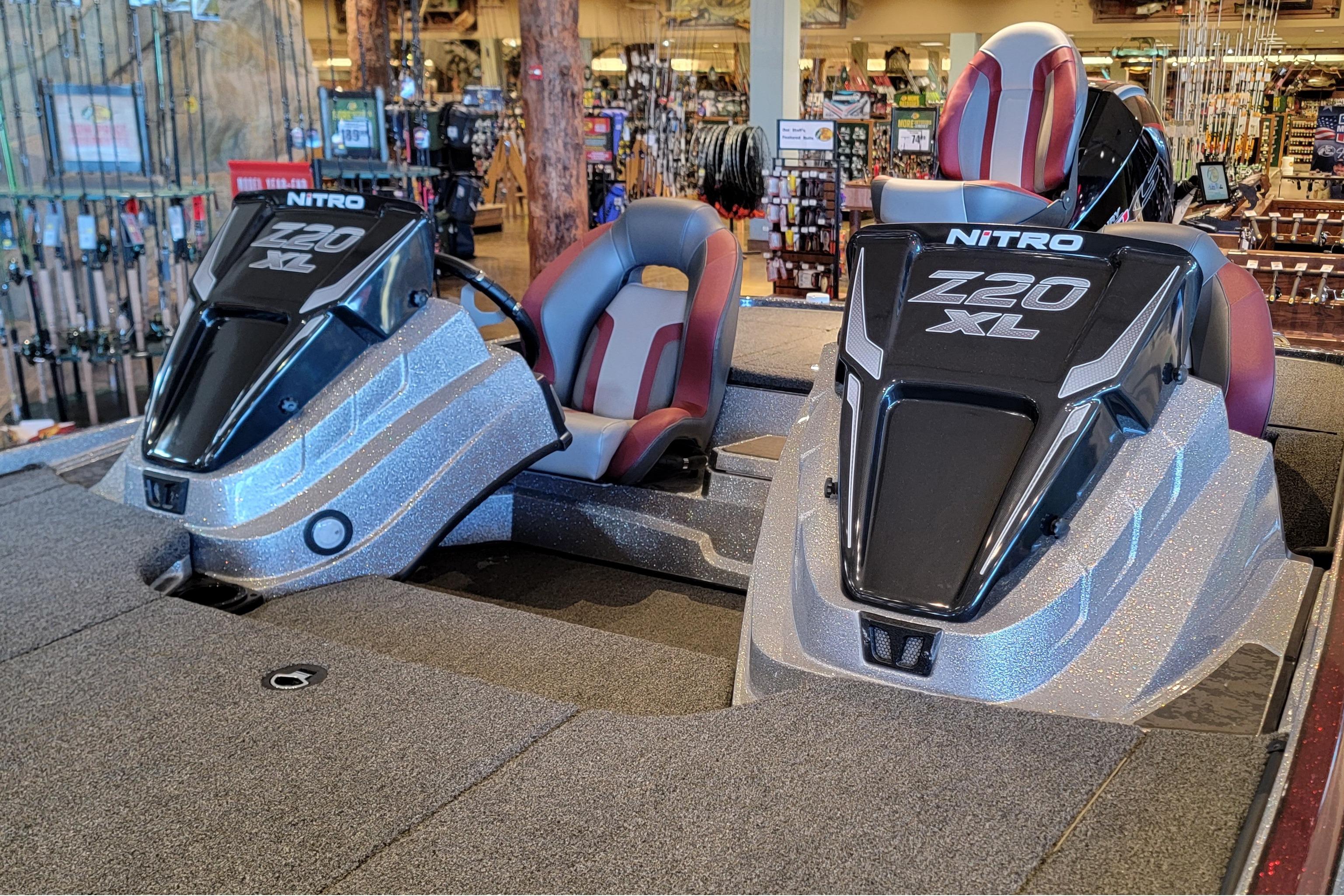 2025 Nitro Z20 XL Pro boat interior with dual seats and control panels.