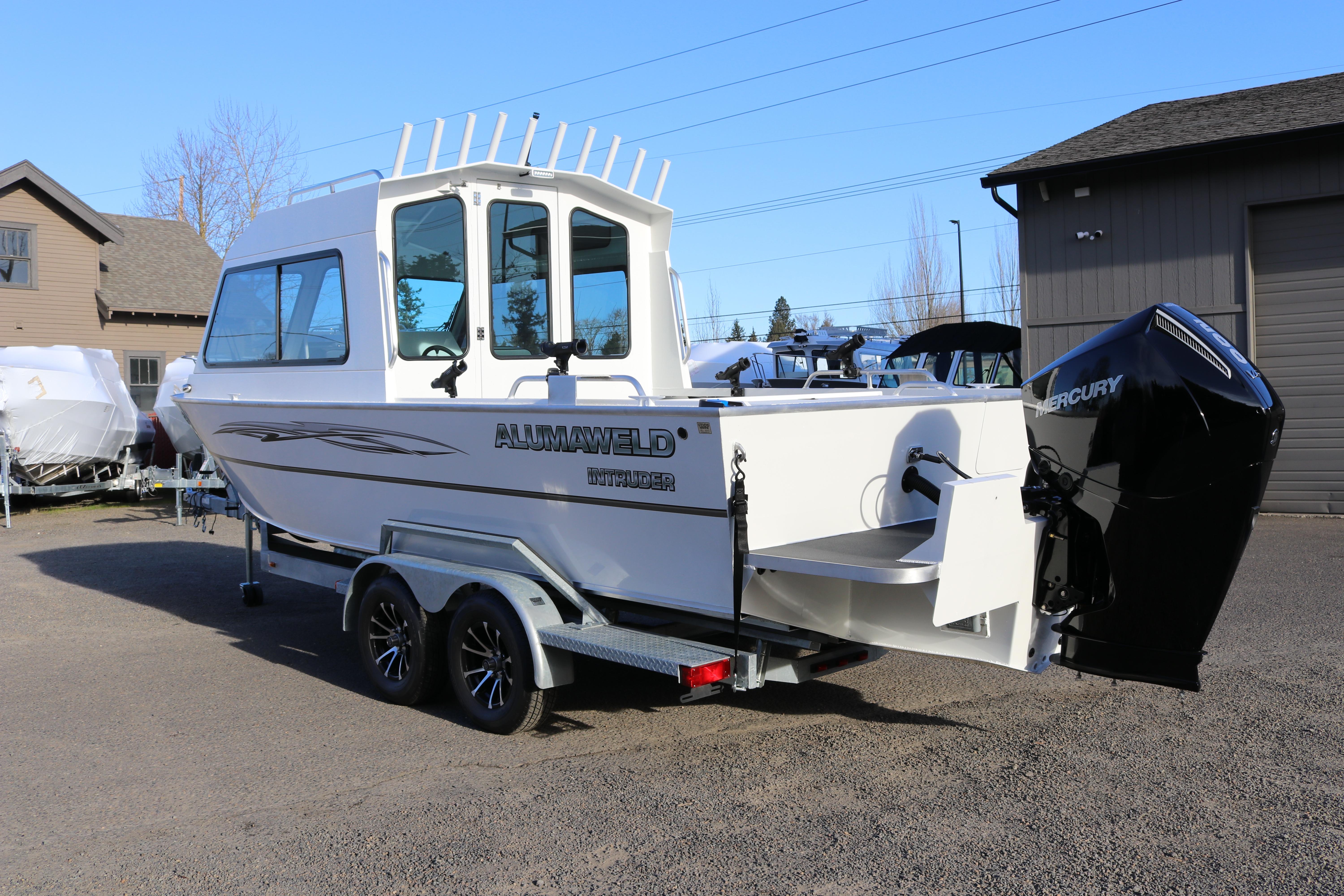 2026 Alumaweld Intruder Outboard 22 boat with Mercury engine on trailer.