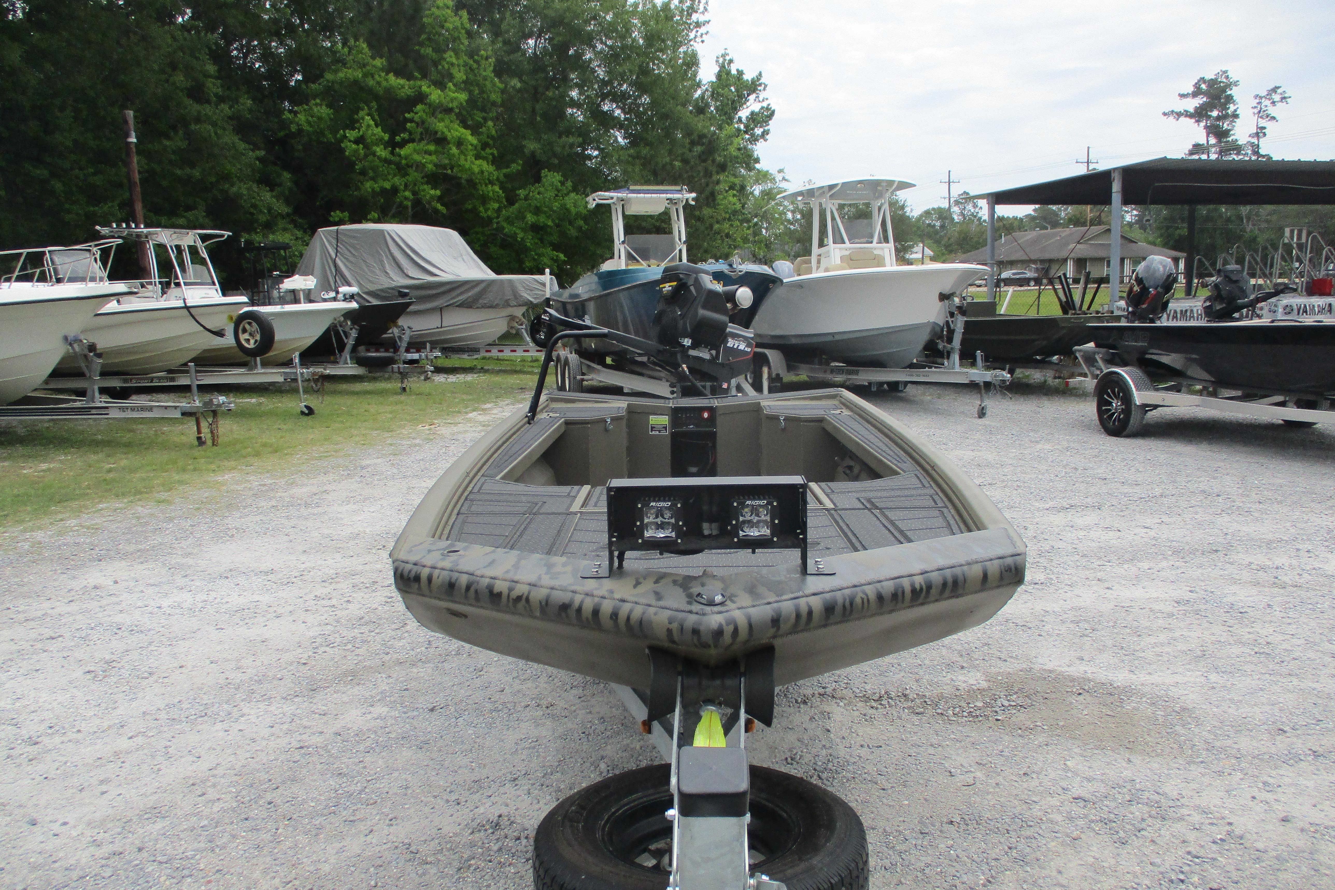 2026 Gator Tail 1854 Extreme boat on trailer in outdoor storage area.