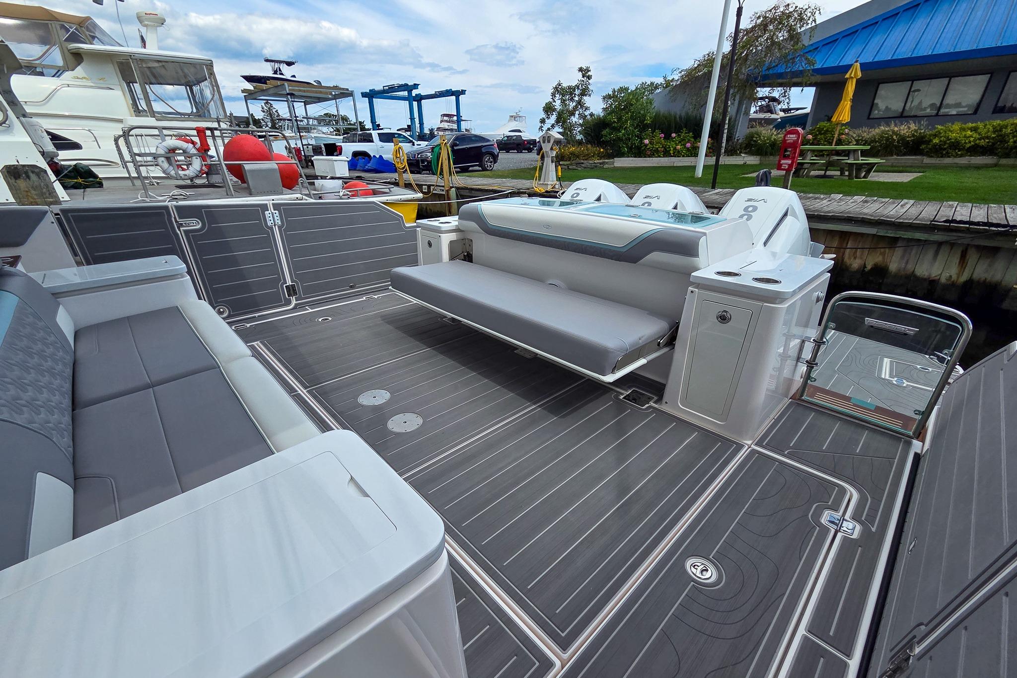 Luxurious 2025 Regal 50 SAV boat deck with modern seating and sleek design.