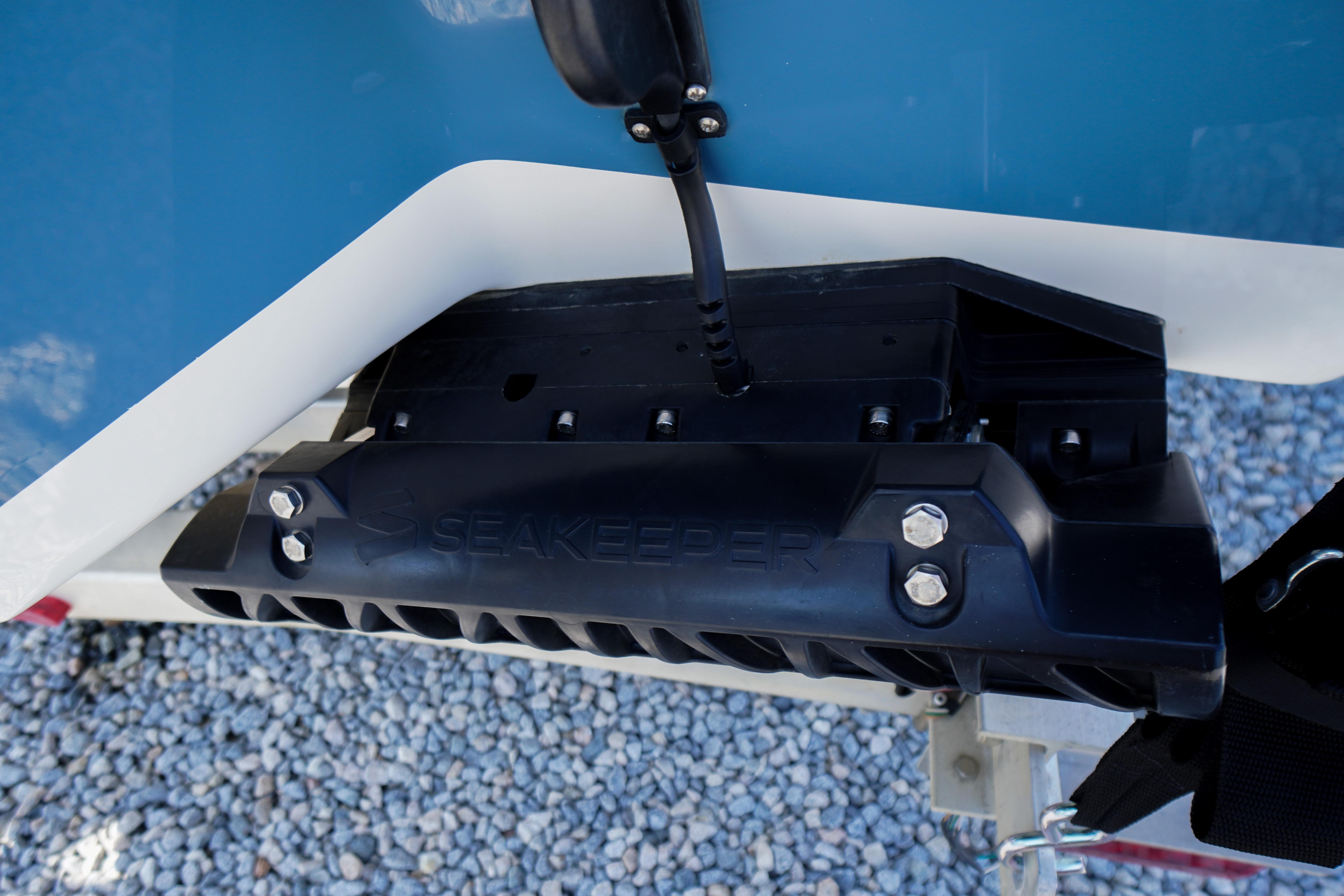 Close-up of Seakeeper device on 2025 Tidewater 232 SS boat hull.