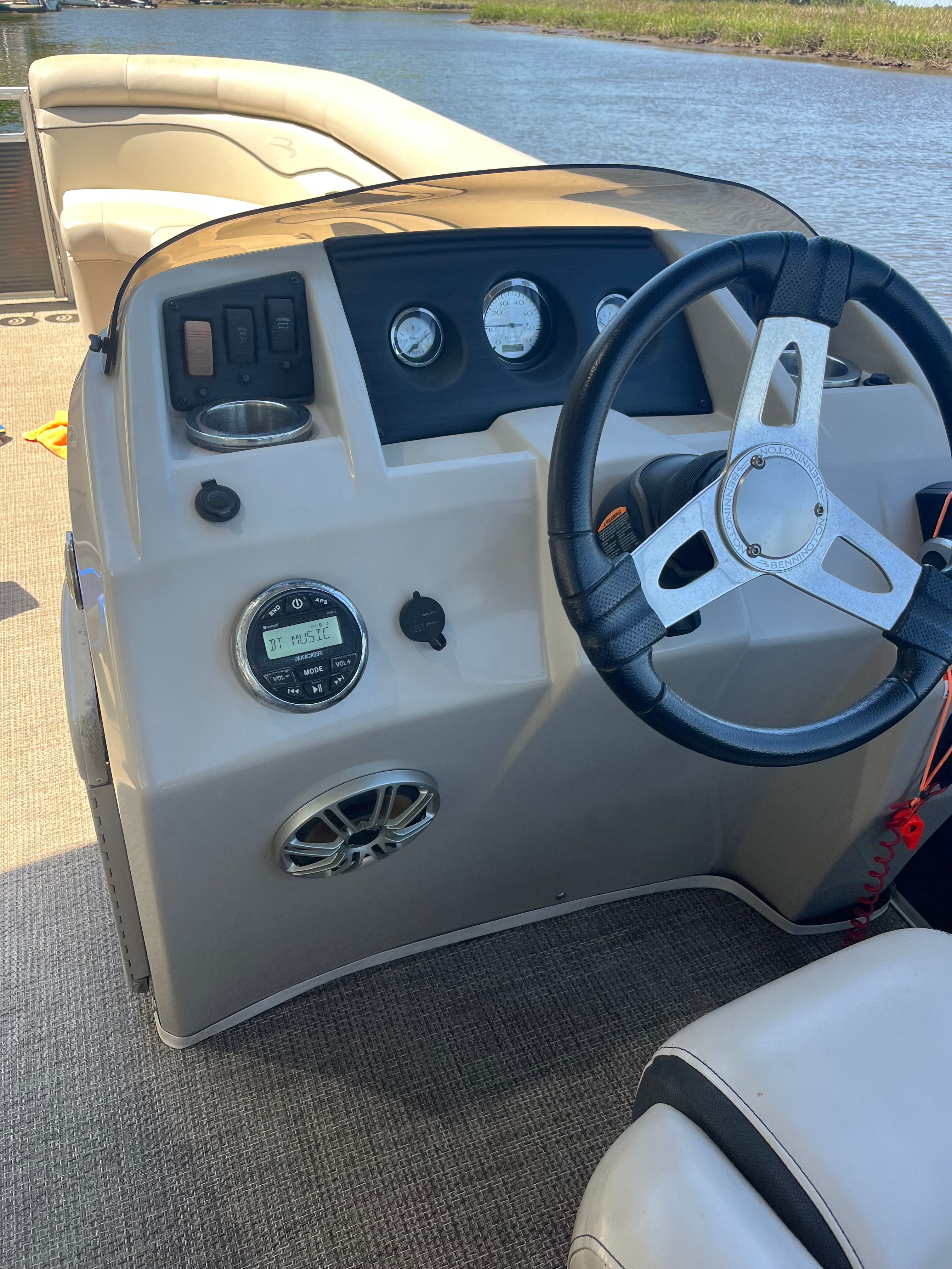 The image shows the helm of a 2019 Bennington 23 SX boat.