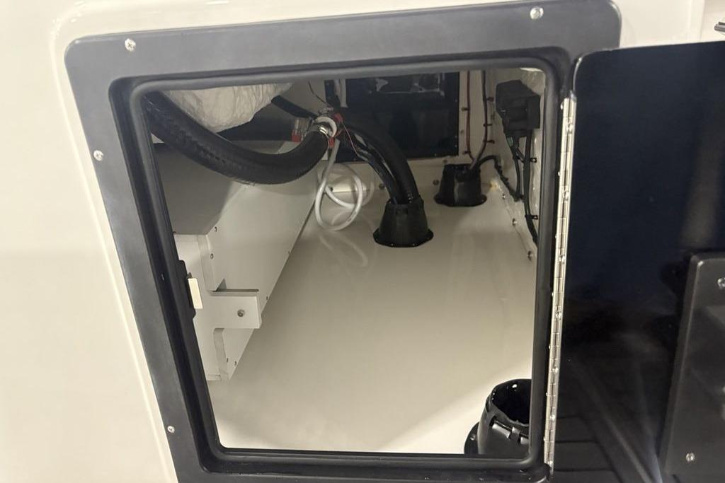 Interior view of 2026 Tidewater 3100 Carolina Bay boat compartment.