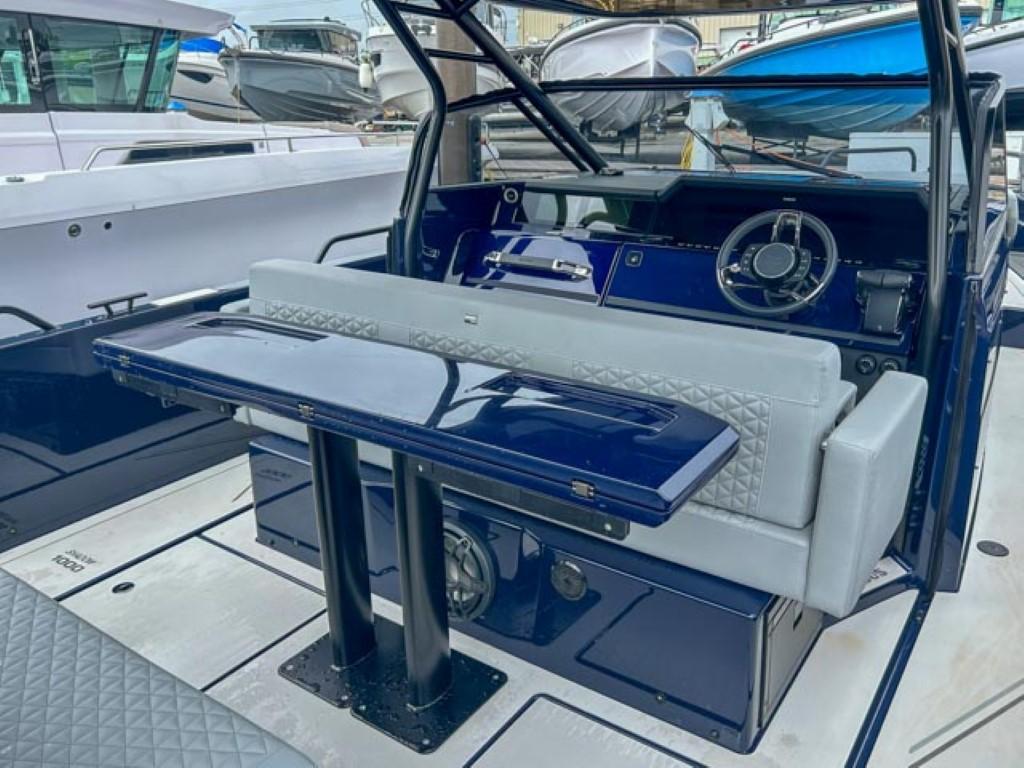 Interior of 2024 BRABUS Shadow 1000 ST luxury boat with sleek seating and modern dashboard.