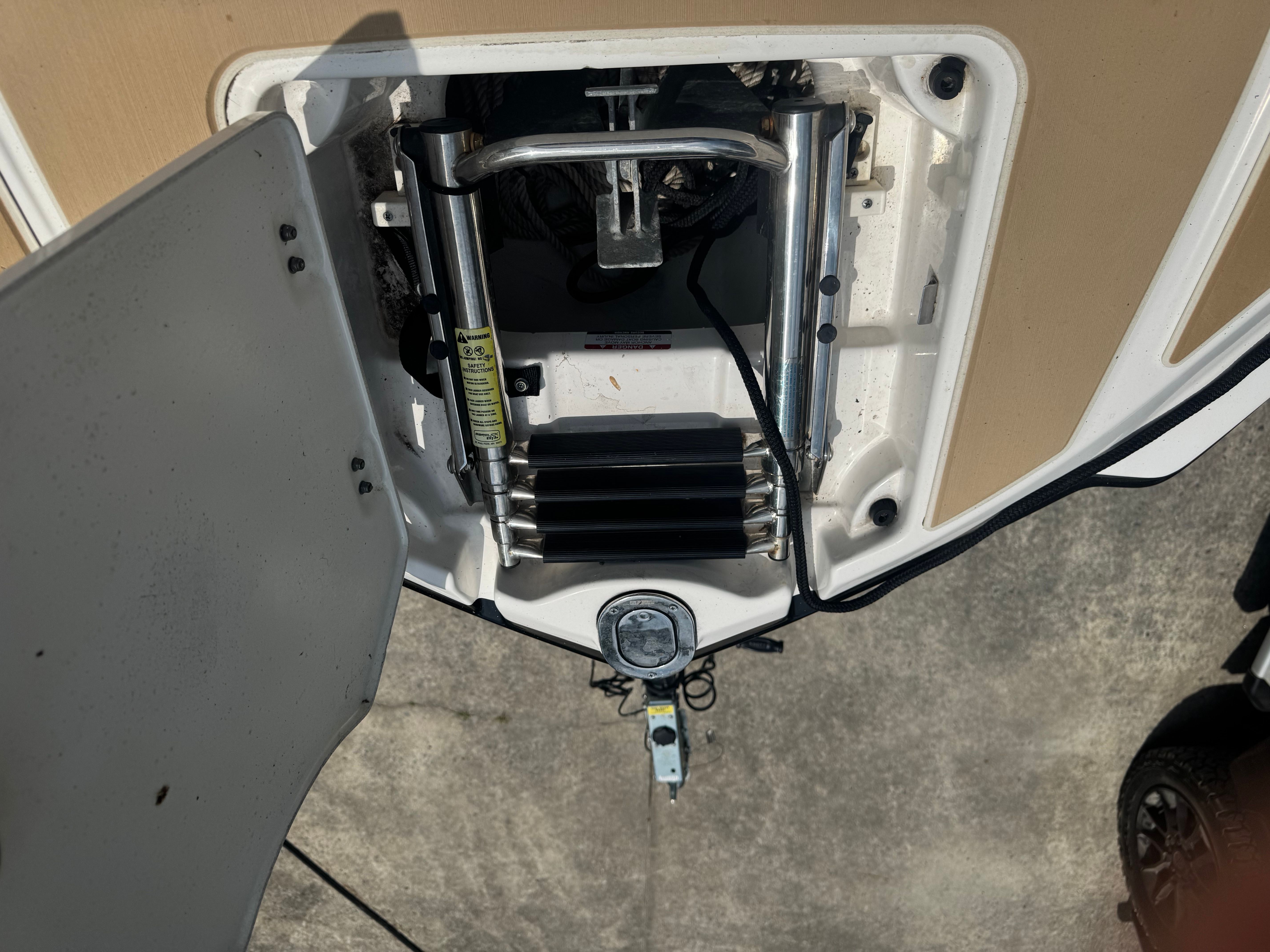 Chaparral 246 SSi 2016 boat ladder in open position.