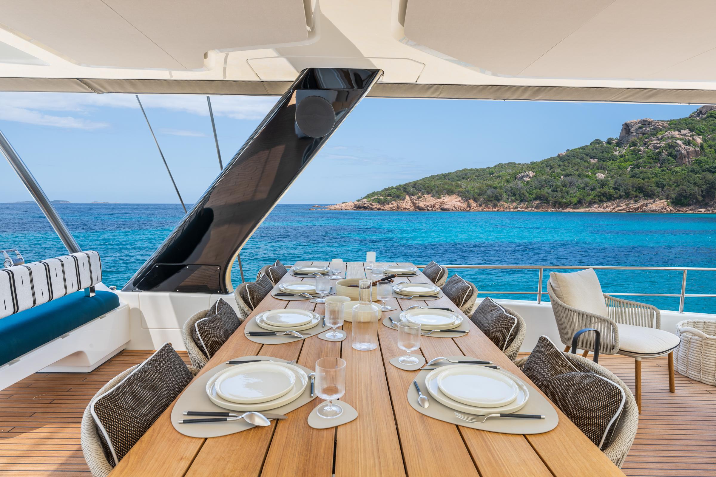 Luxurious Lagoon Eighty 2 yacht dining area with ocean view, 2025 model.