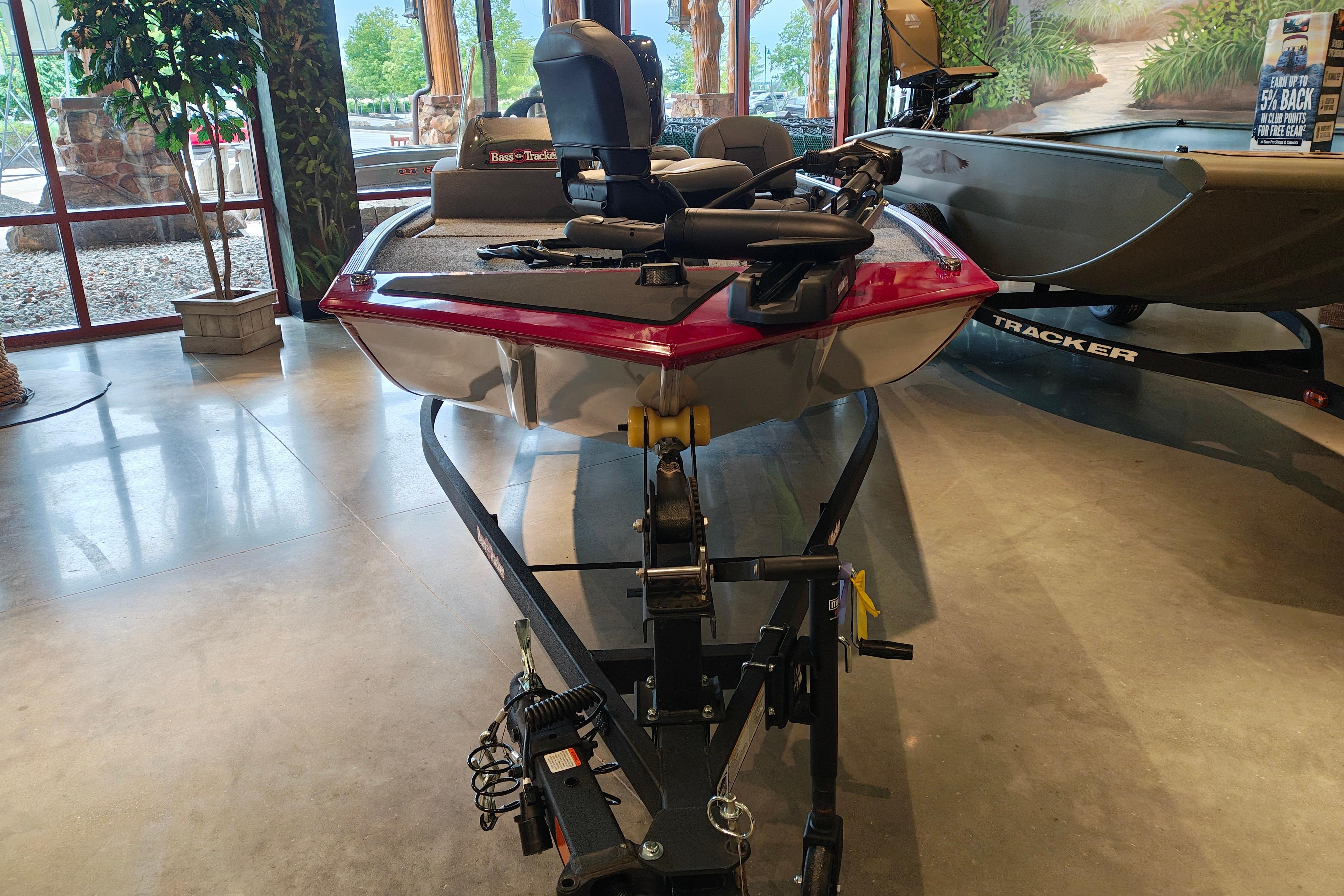 2026 Tracker Bass Tracker Classic XL boat displayed indoors on a trailer.