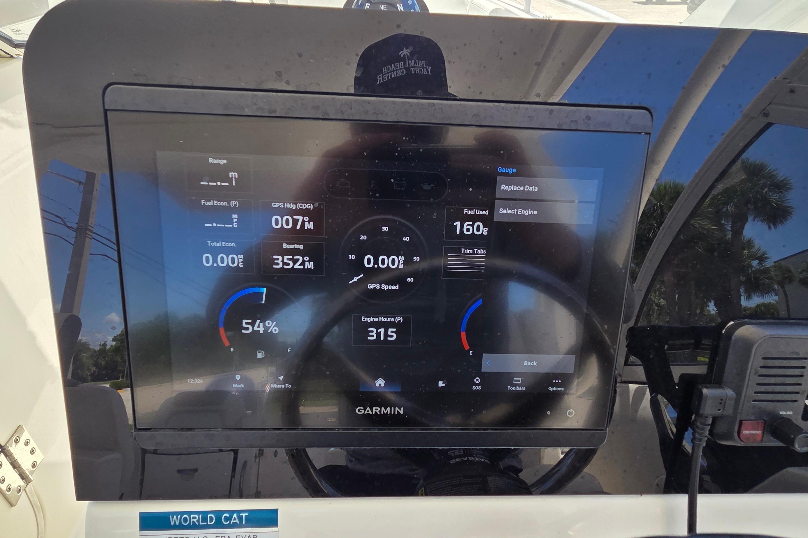 Garmin display on 2022 World Cat 255 DC boat showing navigation and engine data.