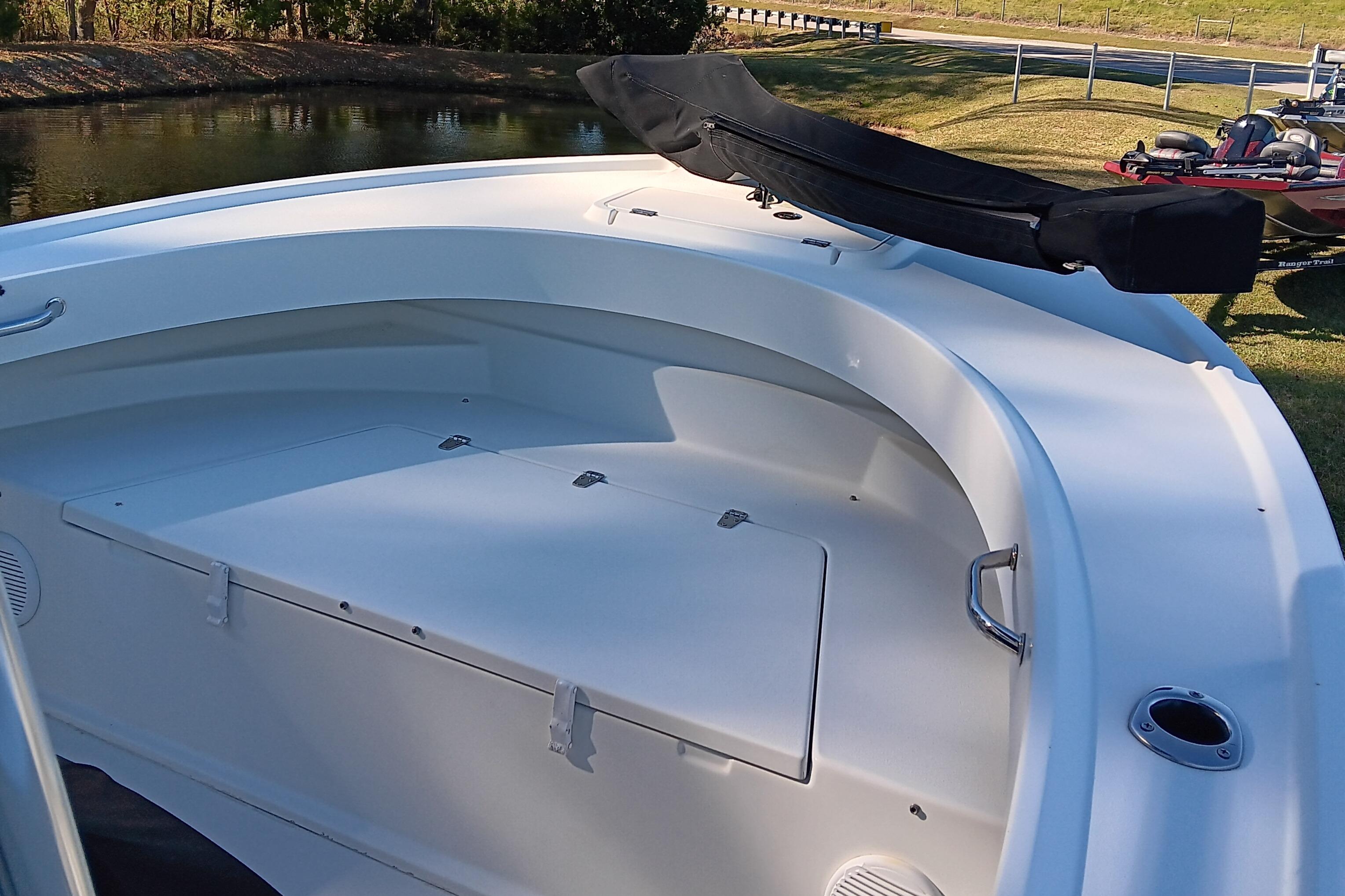 2016 Parker 2300 Special Edition boat interior with seating and storage.
