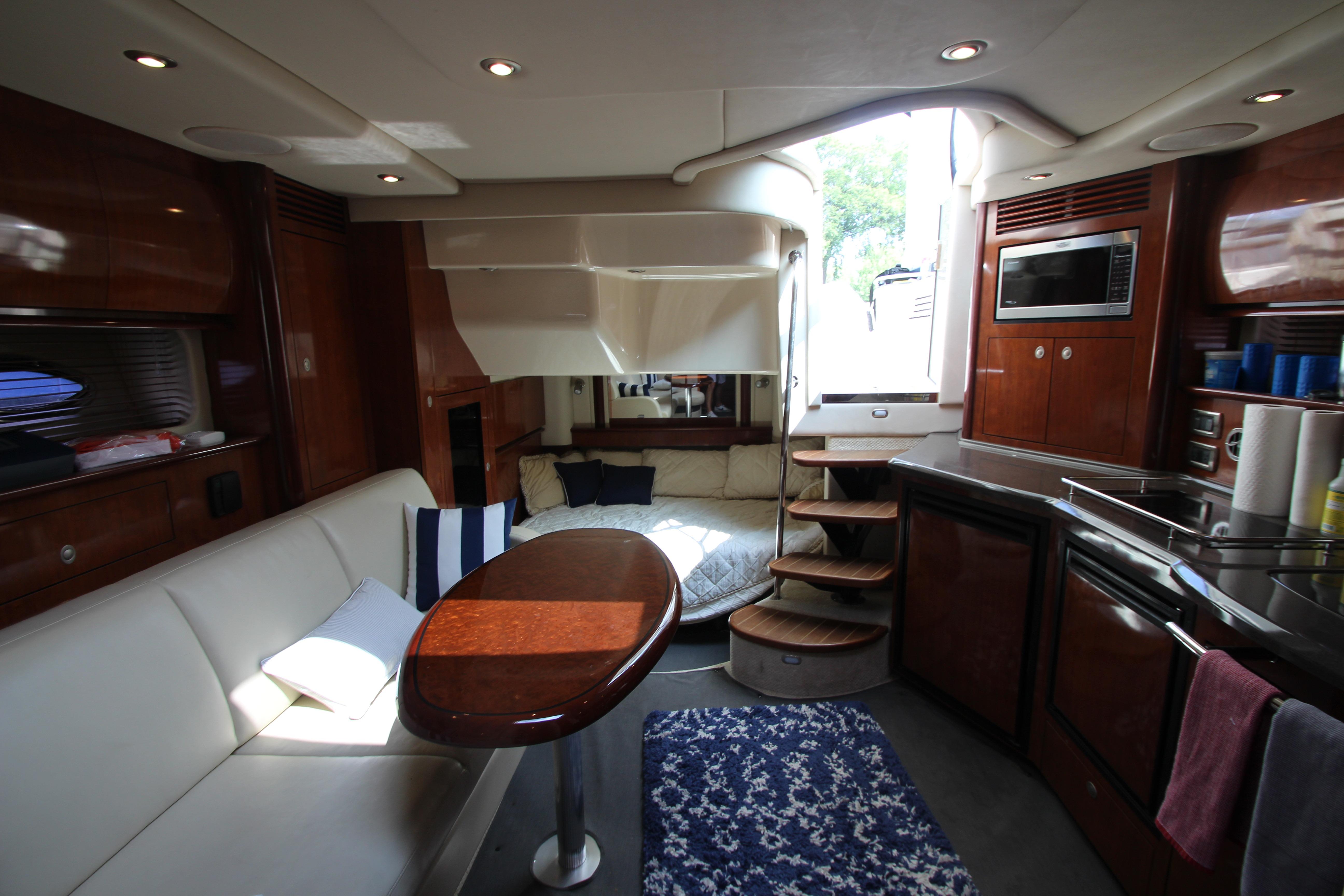 Luxurious interior of 2004 Sea Ray 40 Sundancer yacht with modern amenities and elegant design.