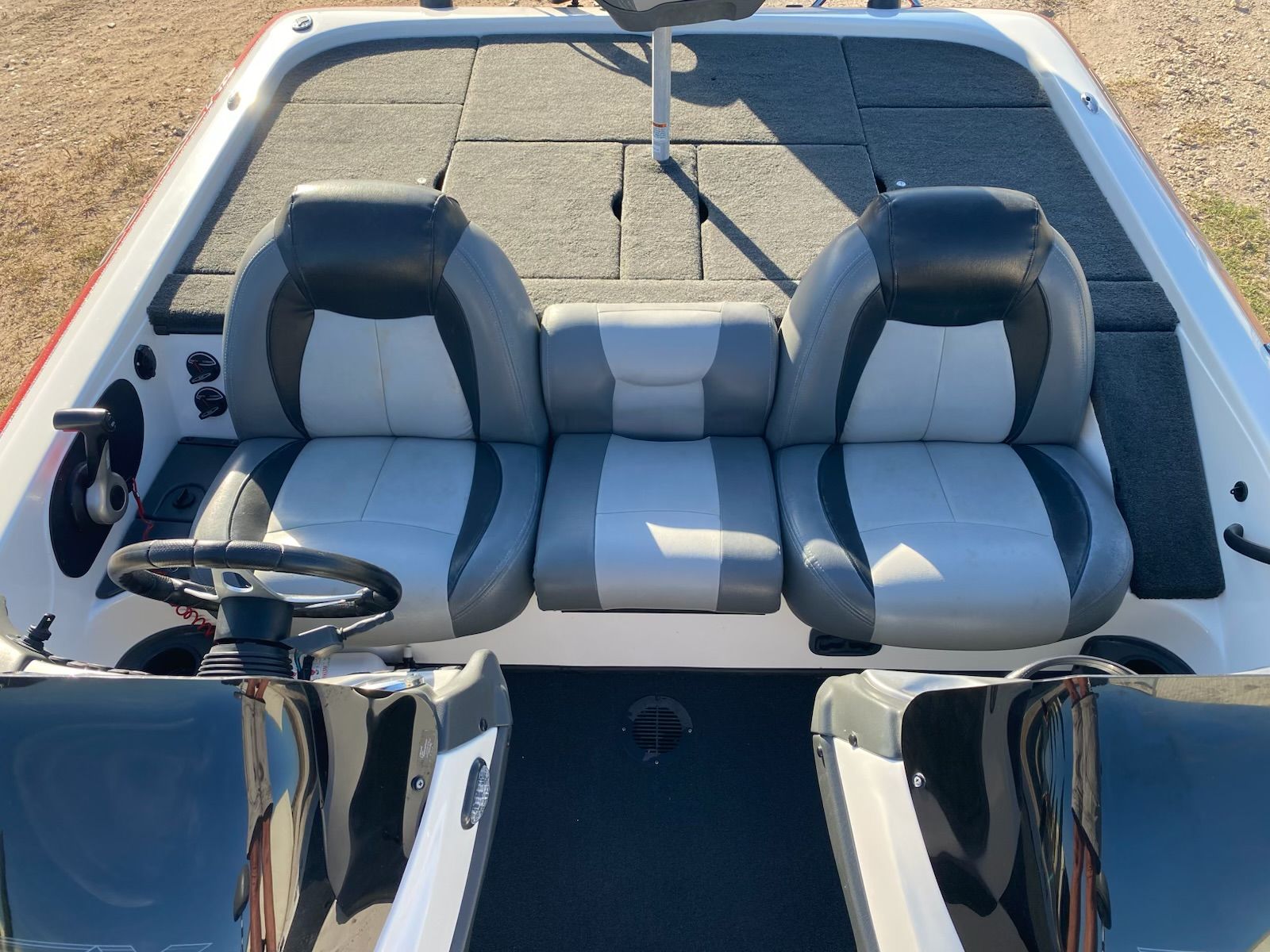 Interior of a 2012 Skeeter ZX20 boat with gray seats.