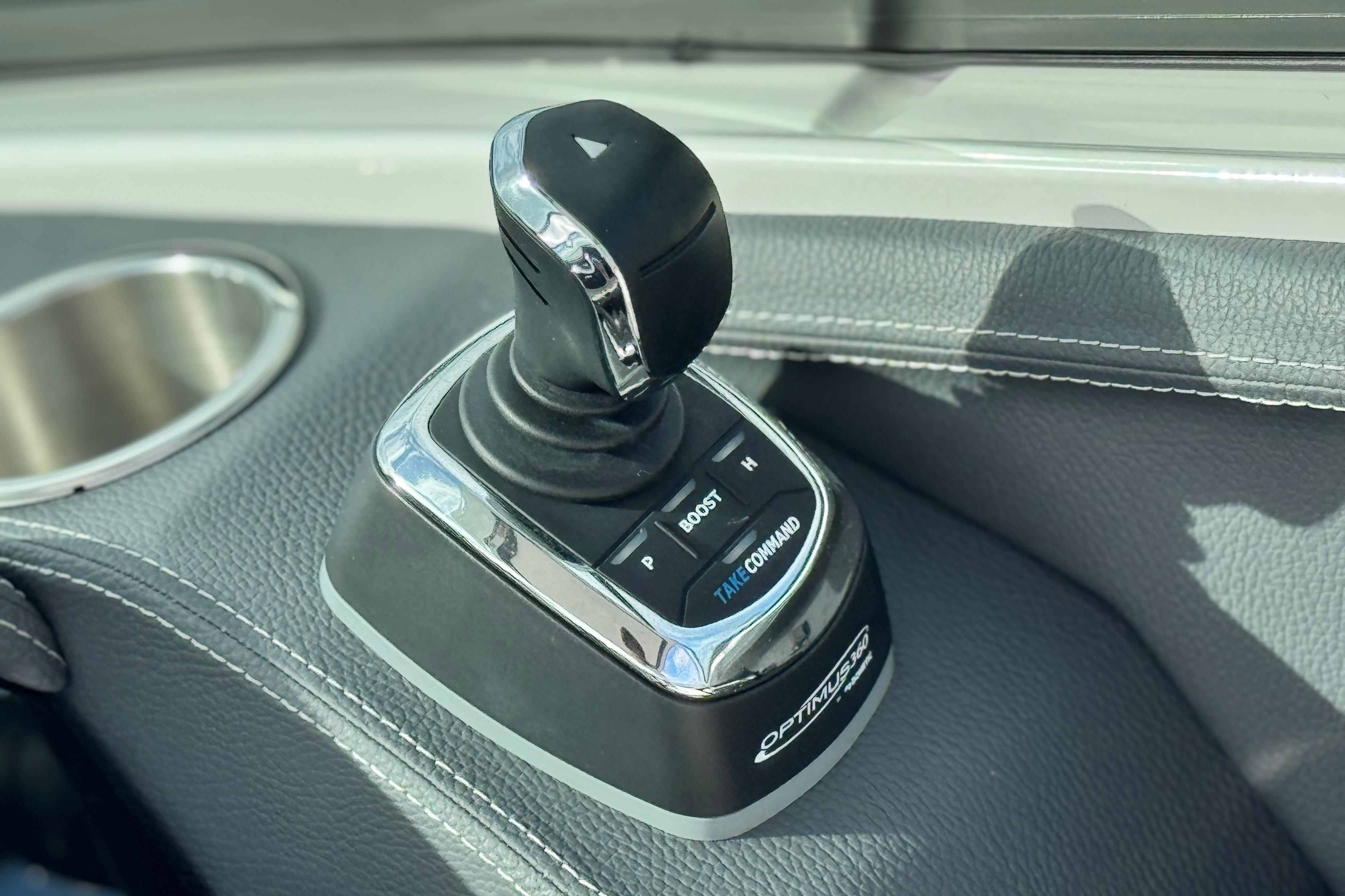 2023 Regal 29 OBX joystick control on leather console, featuring Optimus 360 system.