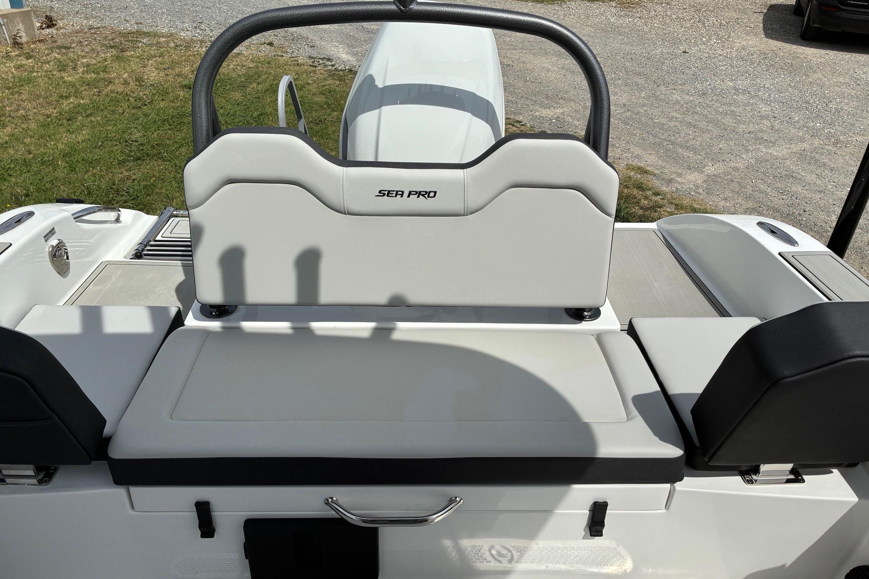 2026 Sea Pro 245FLX Sandbar boat interior with cushioned seating and sleek design.