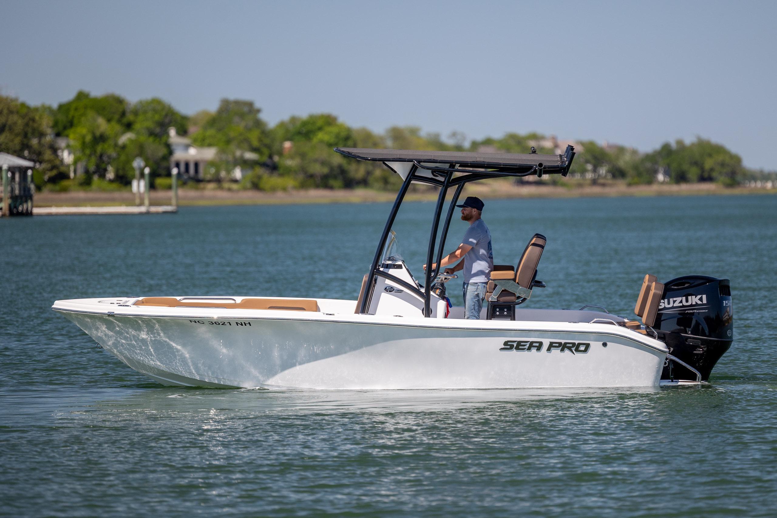 2025 Sea Pro 202 Center Console boat on water, featuring Suzuki outboard motor.