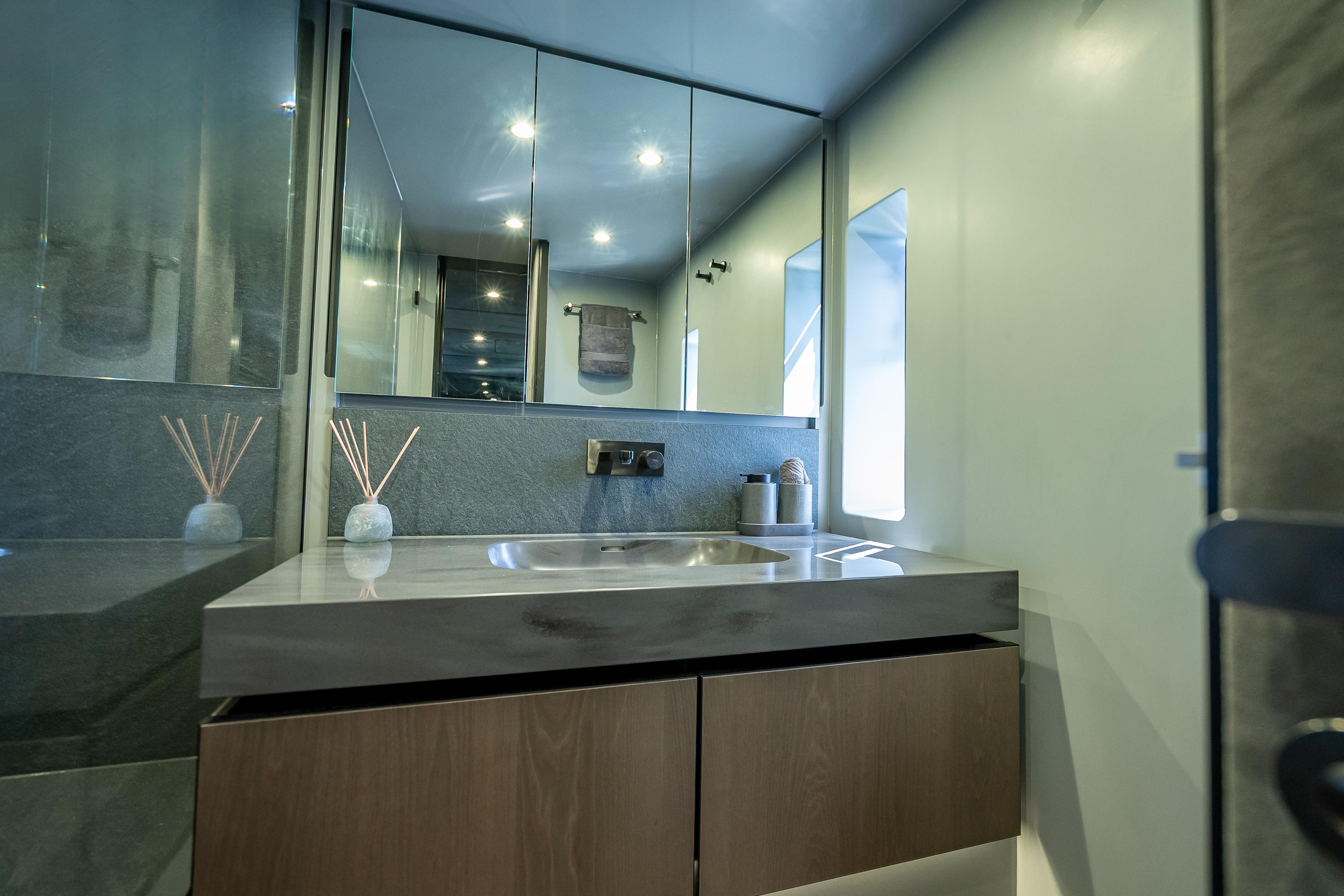 Modern bathroom interior on 2026 Sunreef 60 Power yacht, featuring sleek design and elegant fixtures.