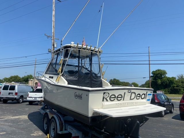 2002 Carolina Classic 25 boat on trailer, "Reel Deal."