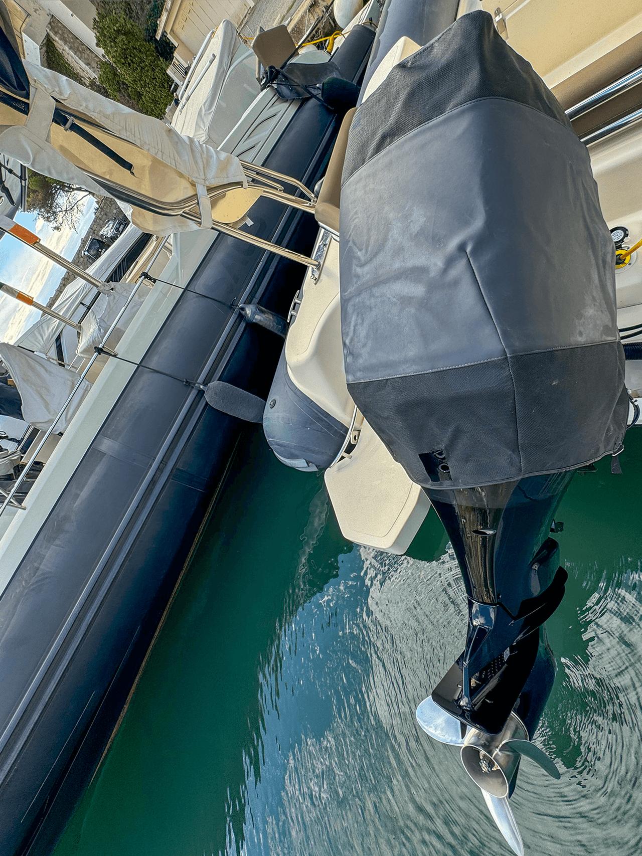 BSC 78 boat docked, featuring covered outboard motor, 2019 model.