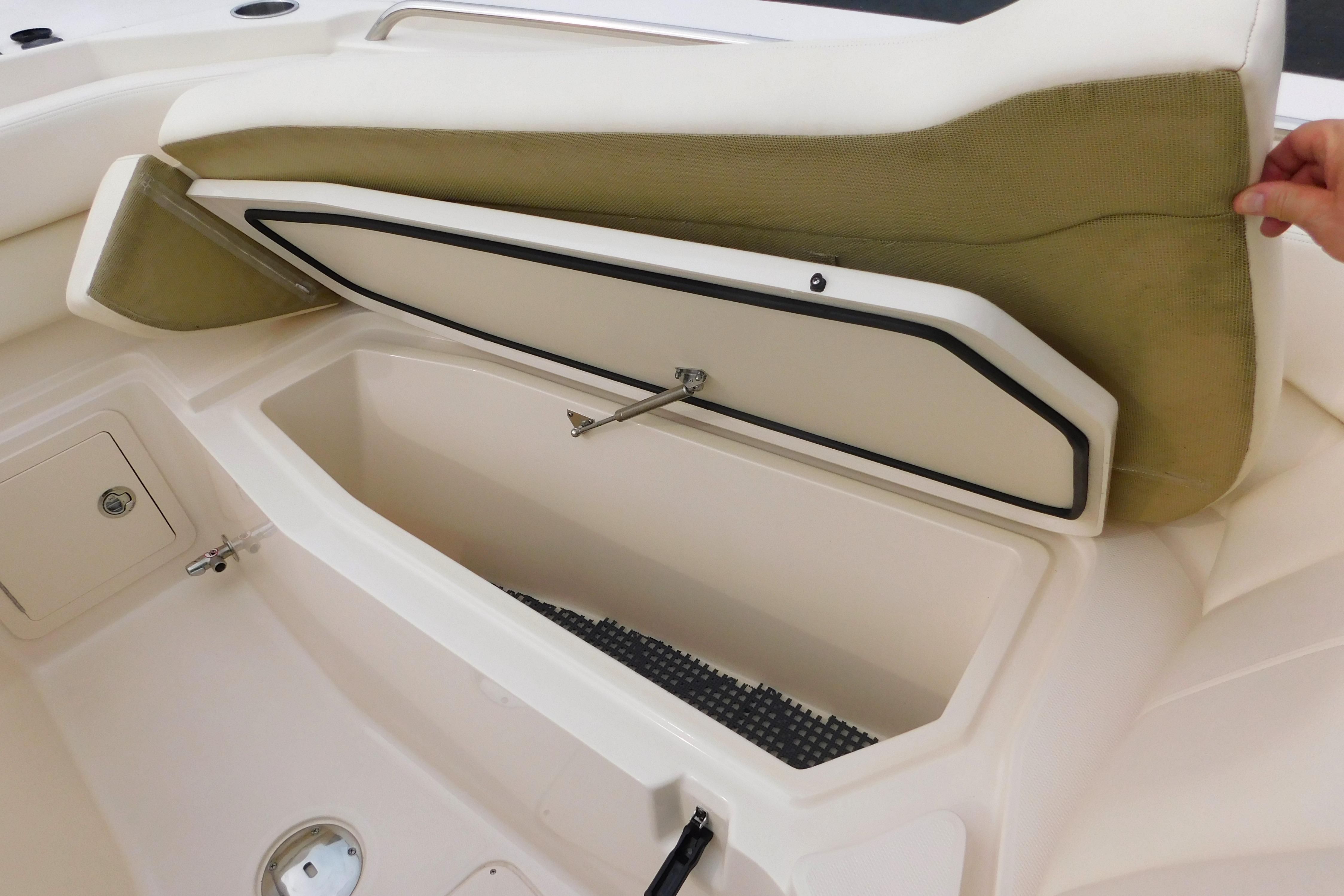 2016 Grady-White Freedom 307 boat storage compartment with open cushioned seat.