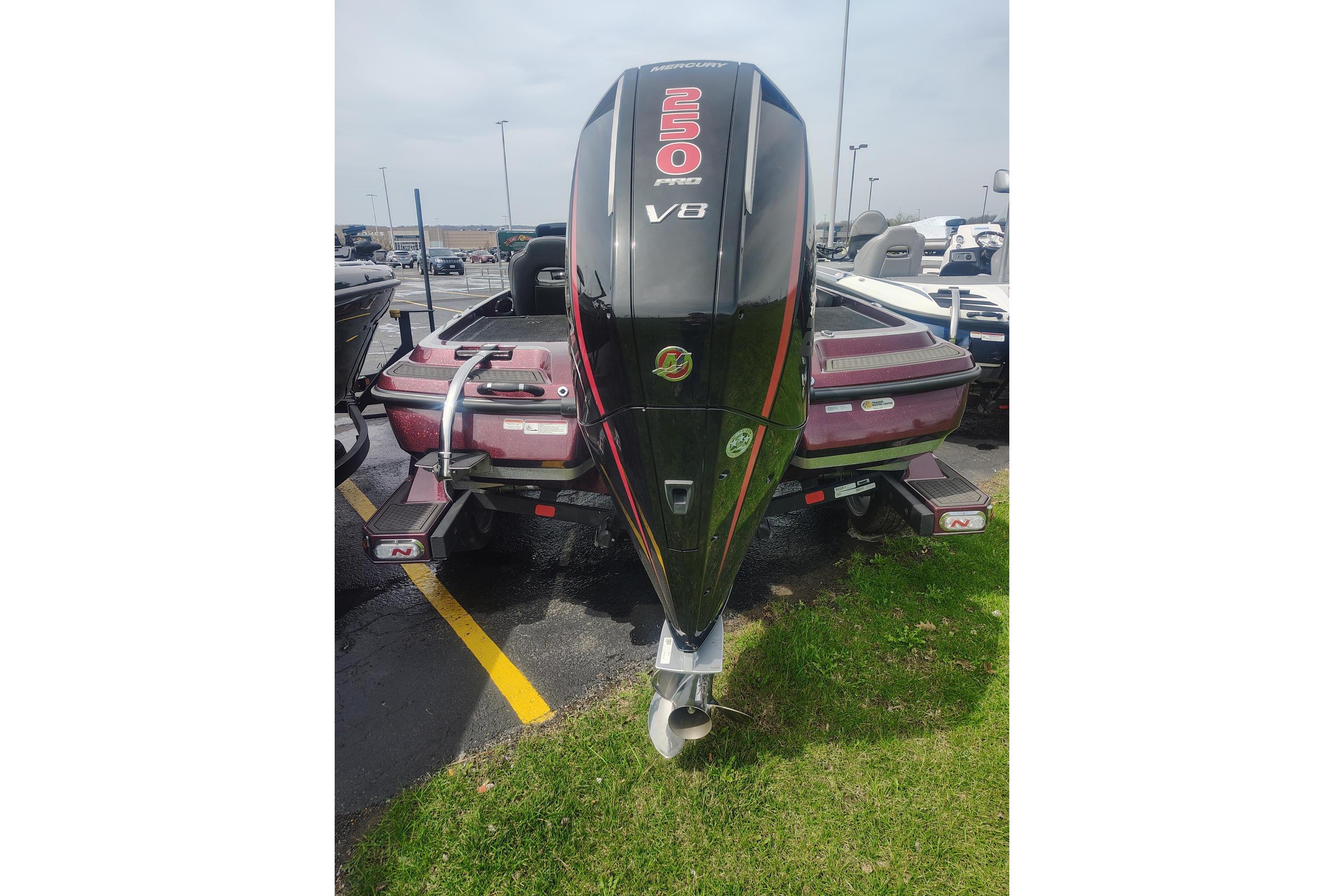 2024 Nitro Z21 XL boat with powerful V8 engine, parked outdoors.