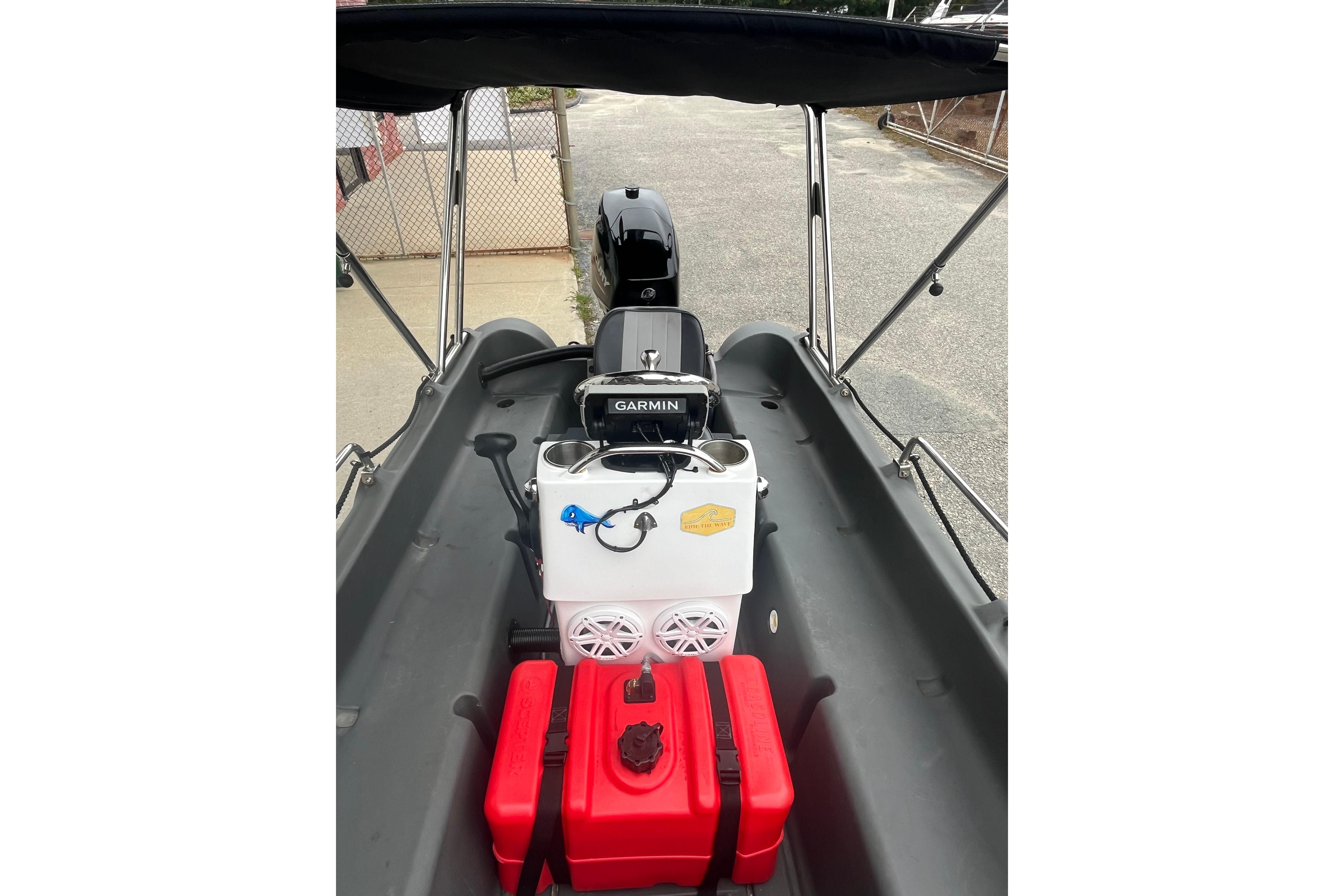 2021 Whaly 435 R boat interior with Garmin equipment and red fuel tank.