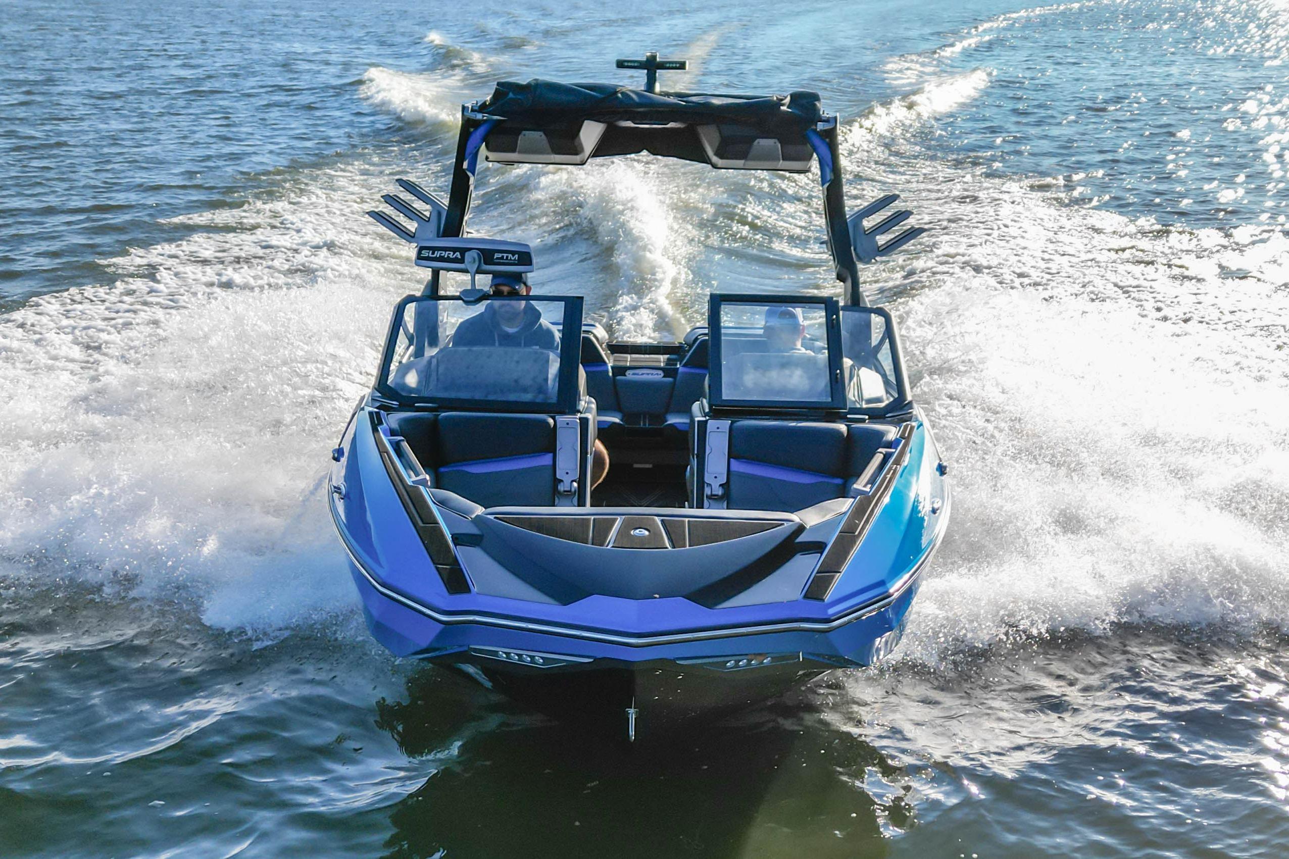 2024 Supra SV 400 boat cruising on open water, showcasing sleek design and powerful performance.
