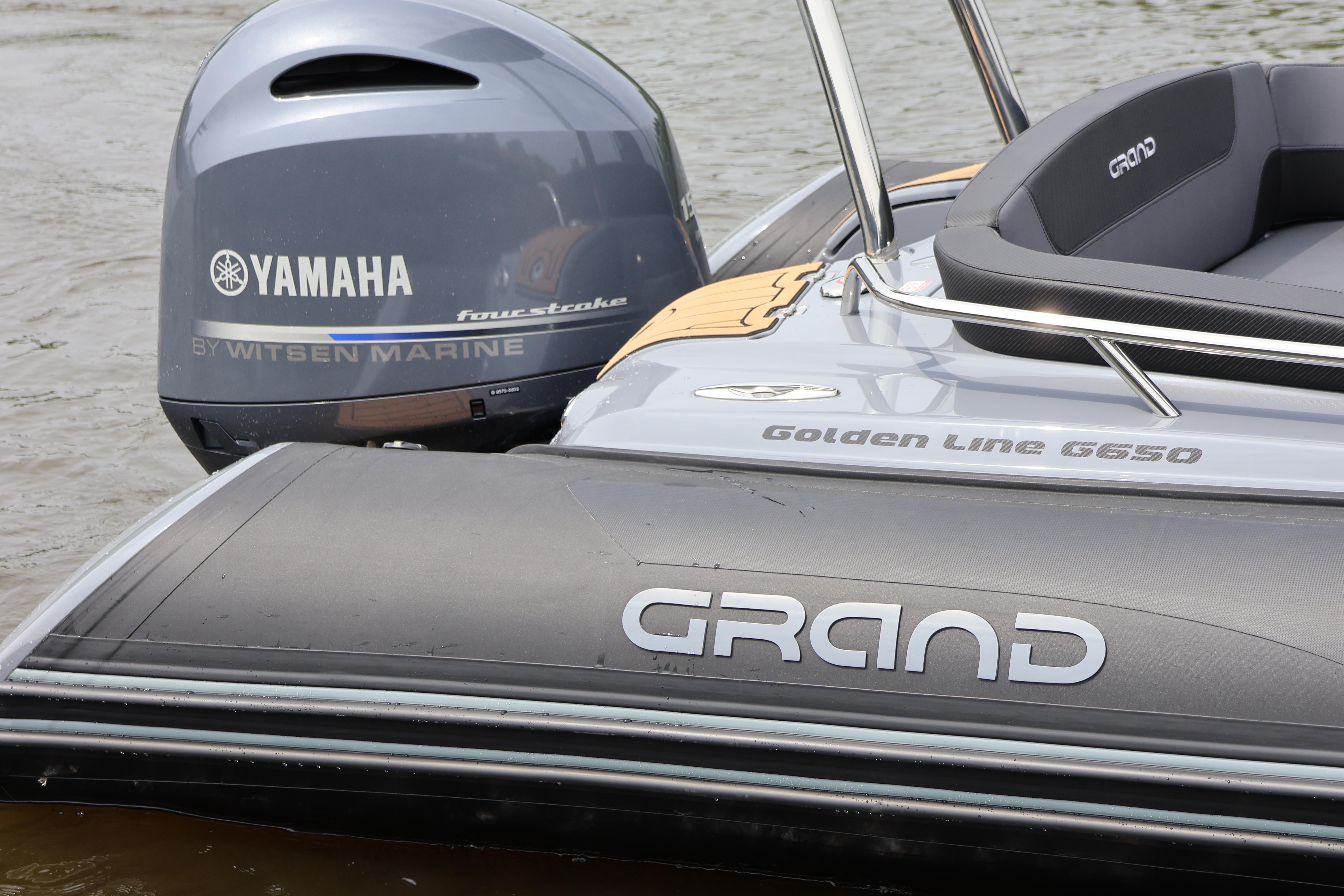 2024 Grand Golden Line 650 boat with Yamaha engine on water.