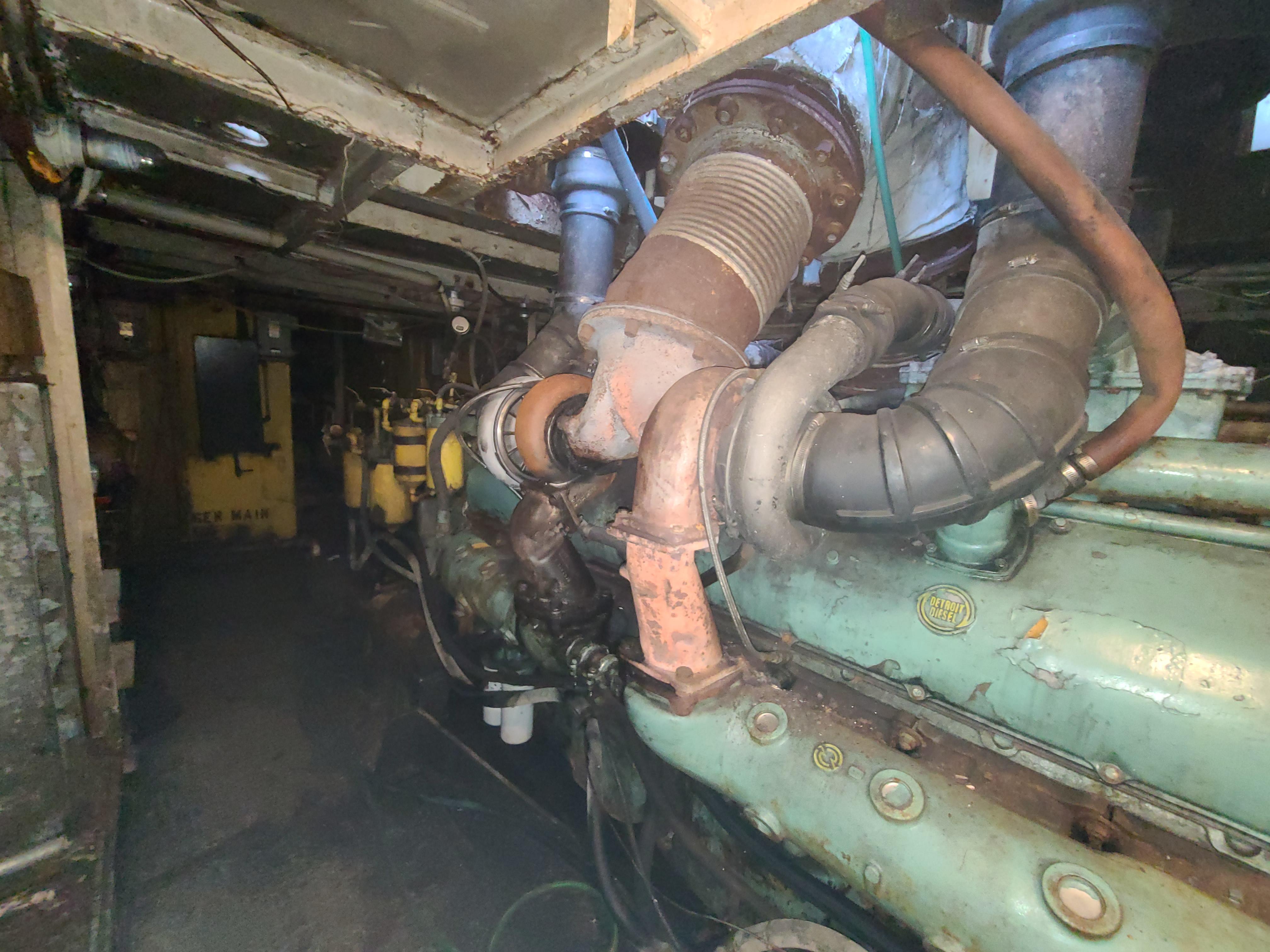 Engine room of a 1903 Johnson Brother Tug 64 with visible machinery.