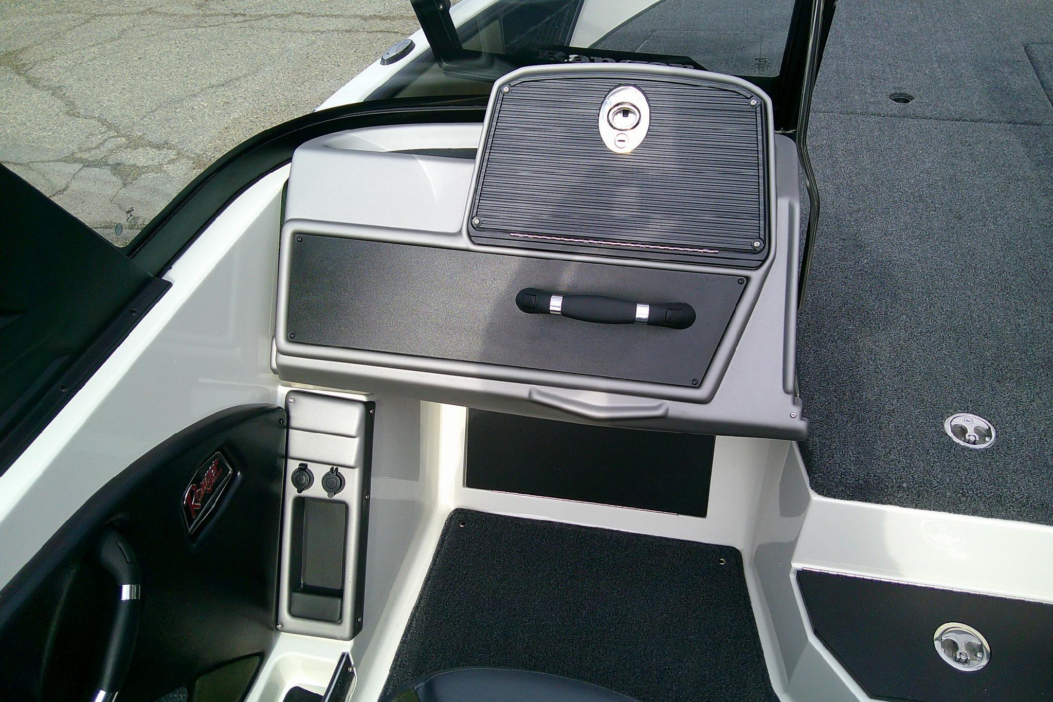 Interior view of 2026 Ranger 1880MS boat dashboard with storage compartment.