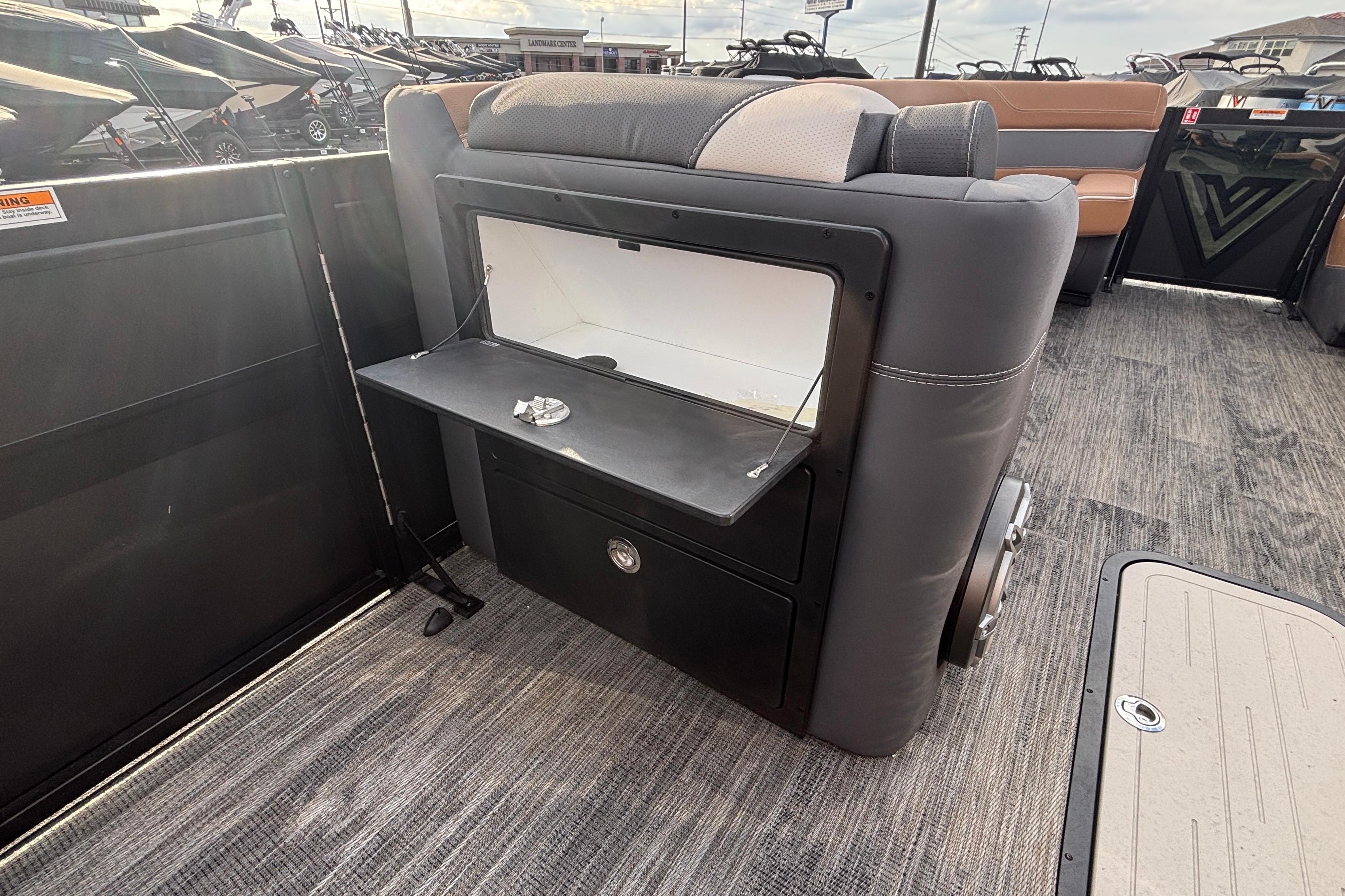 Interior of 2026 Viaggio Diamante U 26 boat with seating and storage compartment.