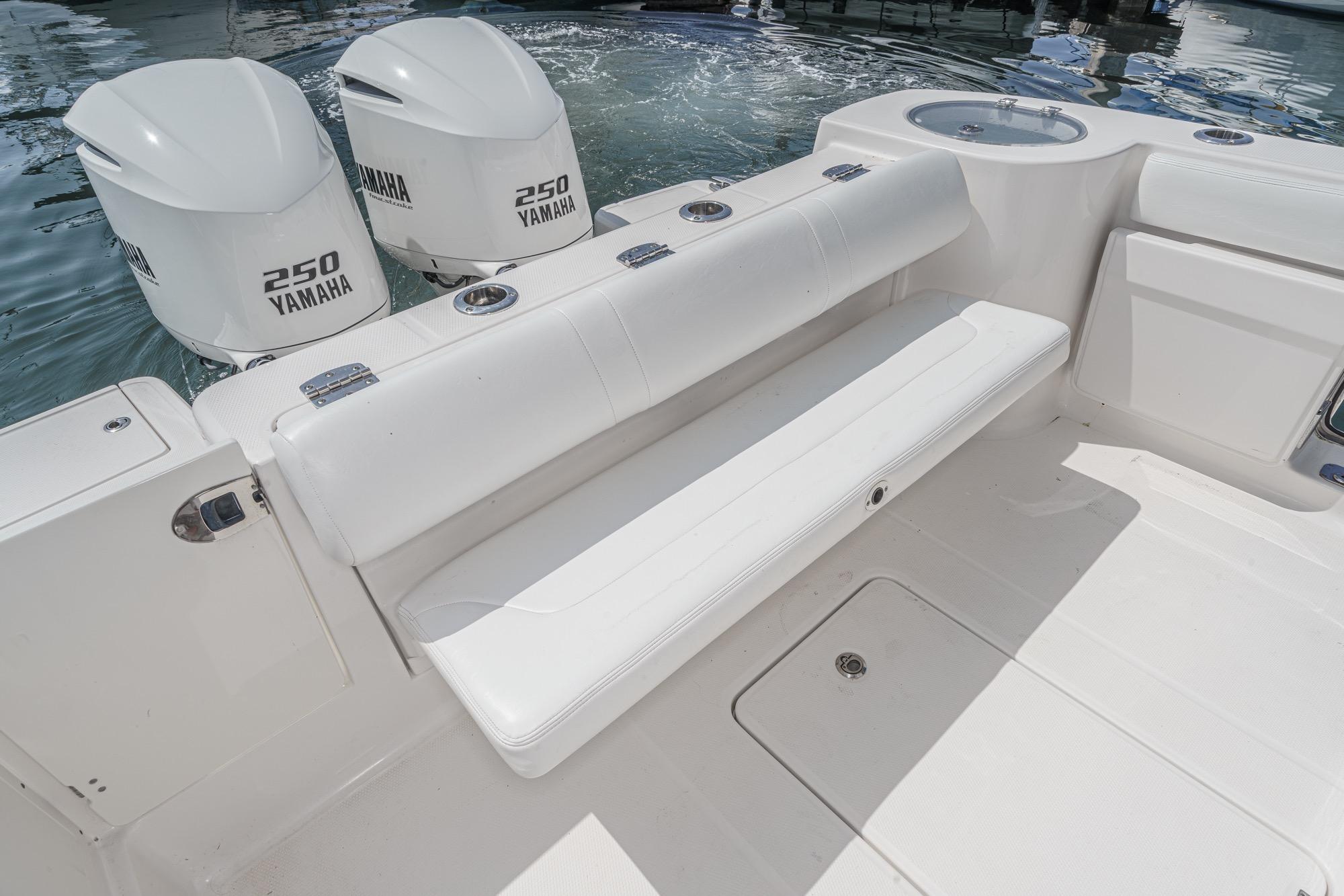 2020 Robalo R272 Center Console boat with Yamaha 250 engines and white seating.